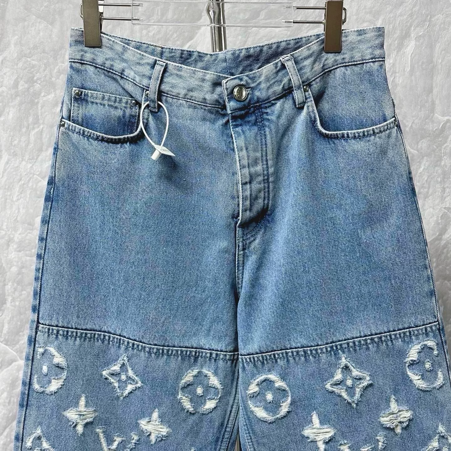 Louis Vuitton SS25 Distressed Logo Jeans — front