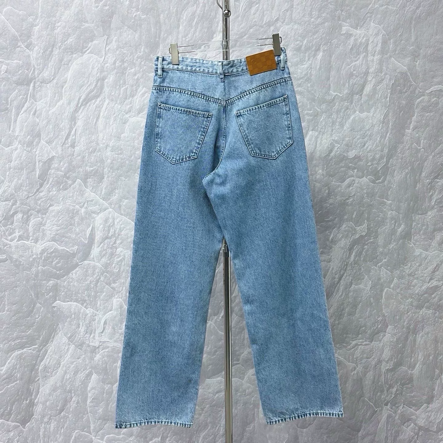Louis Vuitton SS25 Distressed Logo Jeans — back