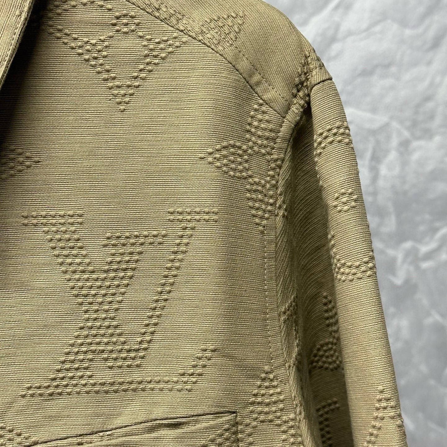 Louis Vuitton SS25 Embossed Monogram Coat 48 — detail