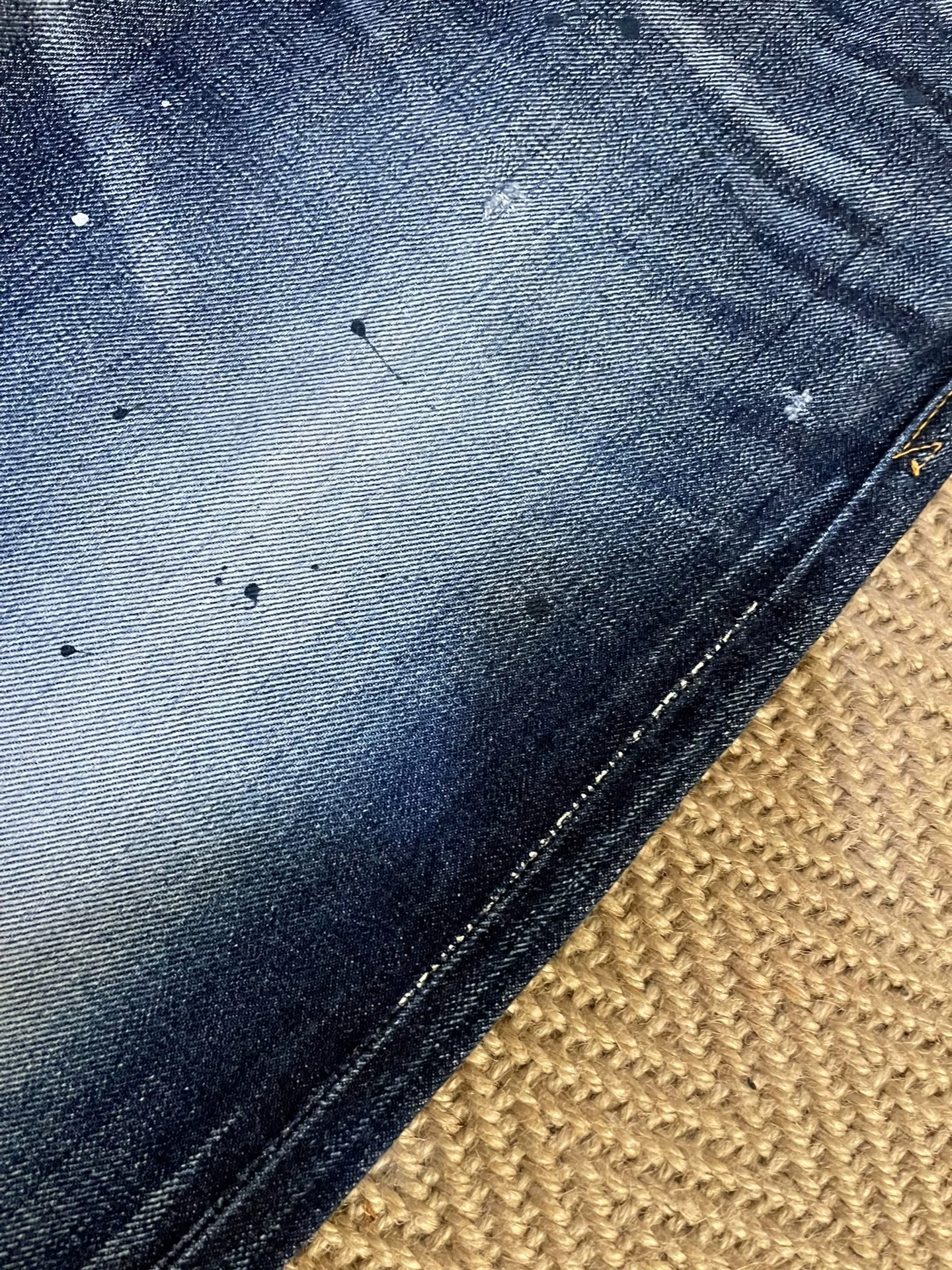 Vanquish Fragment Washed Splatter Lightning Crop Jeans — label