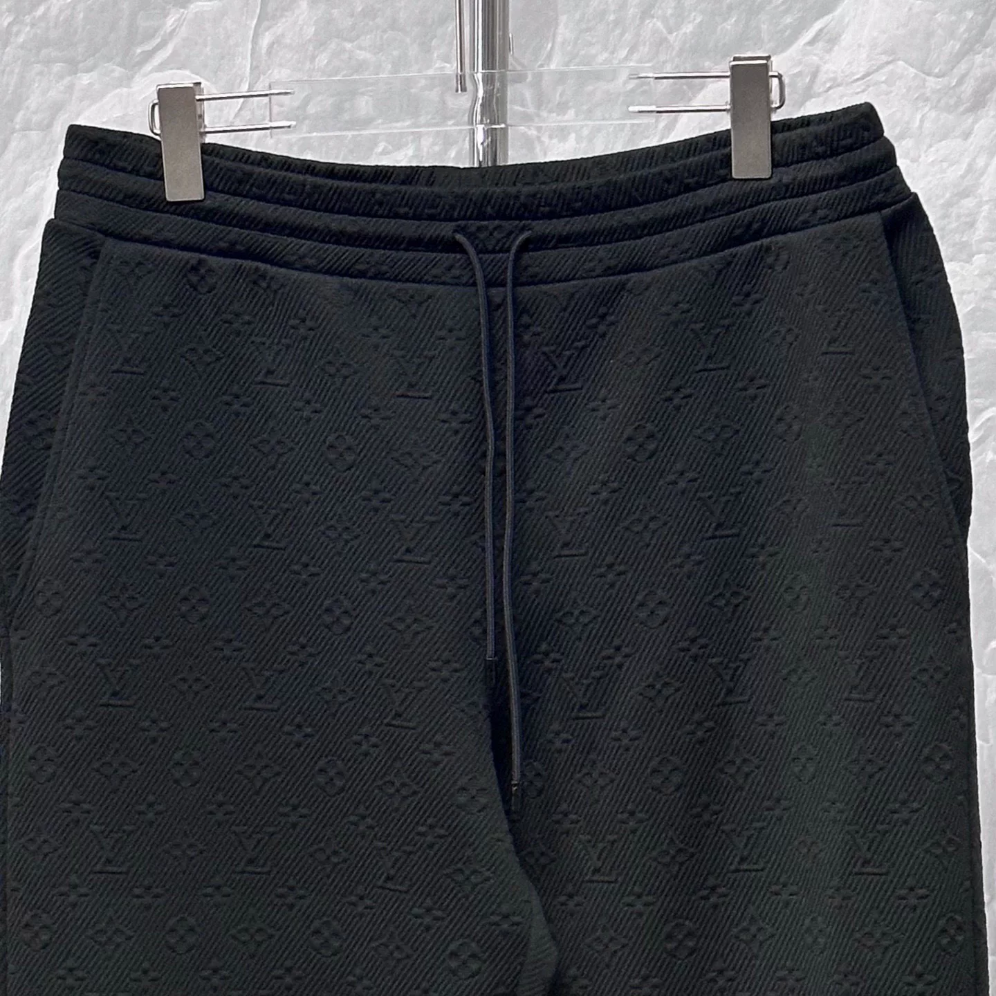 Louis Vuitton Black Embossed L Pants — front