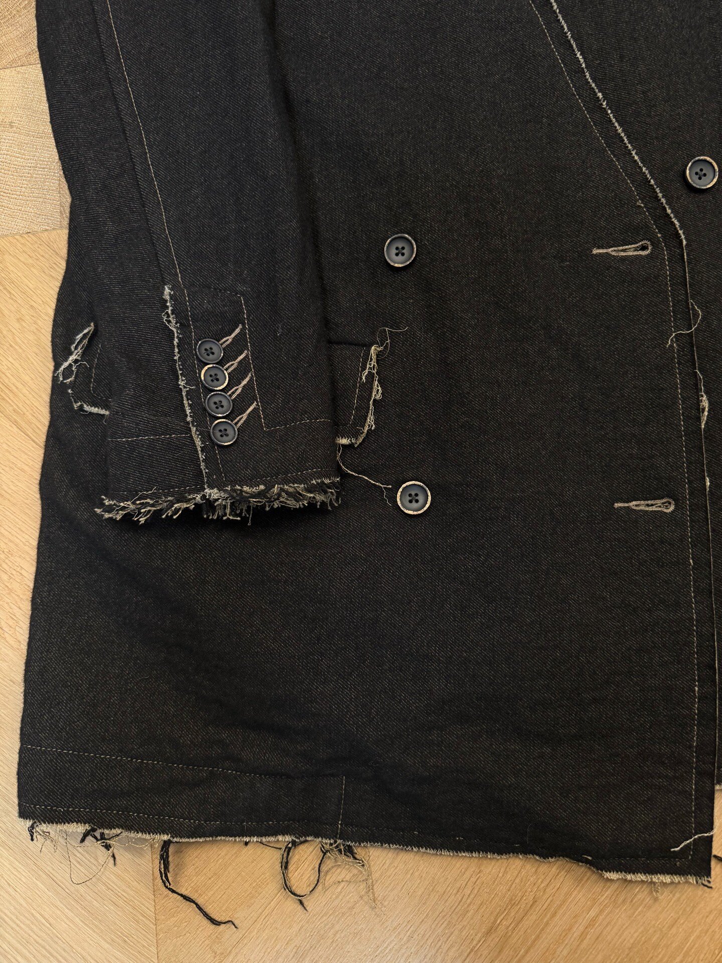 UMA WANG Black Distressed Coat — detail