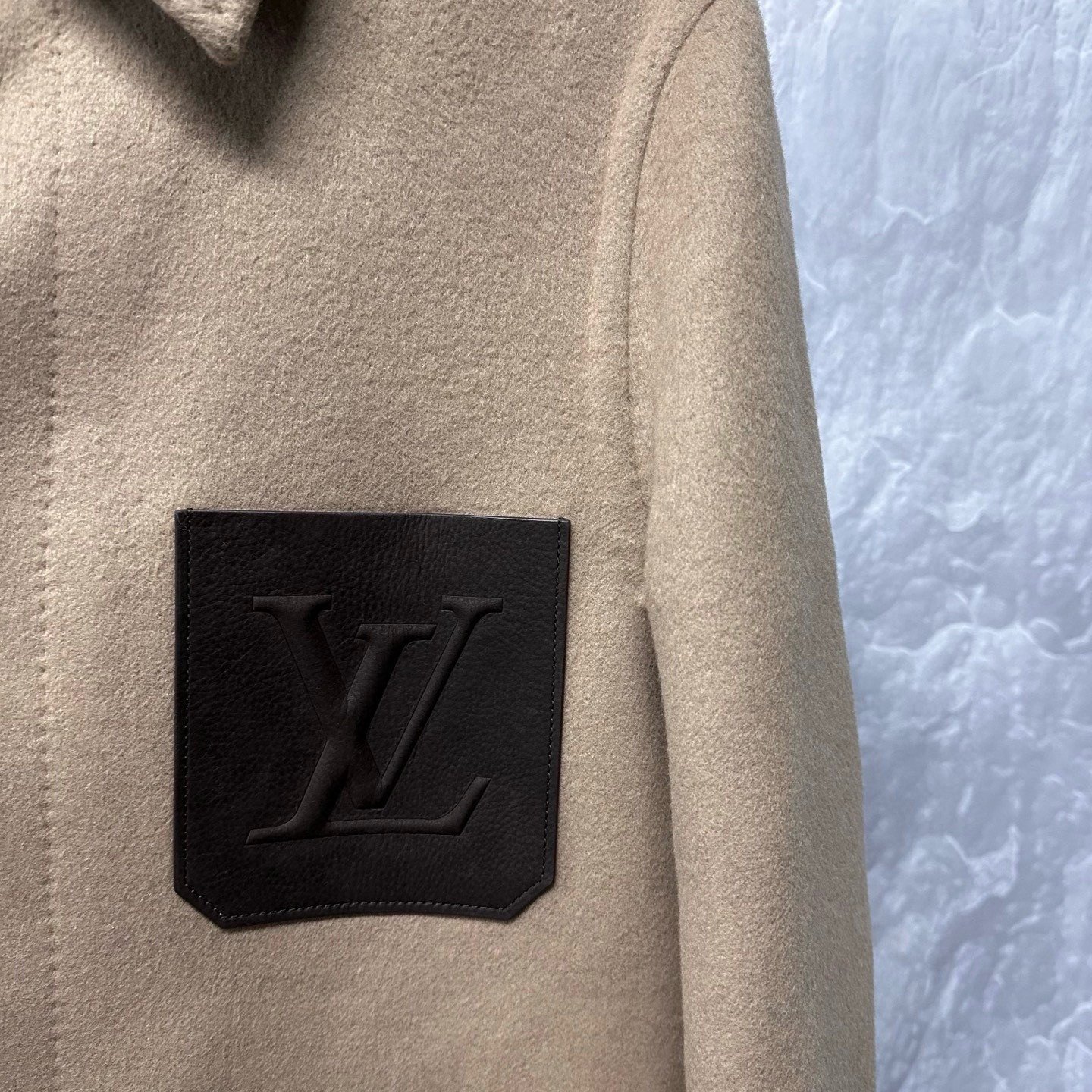 Louis Vuitton SS26 Embossed Pocket Wool Coat — detail