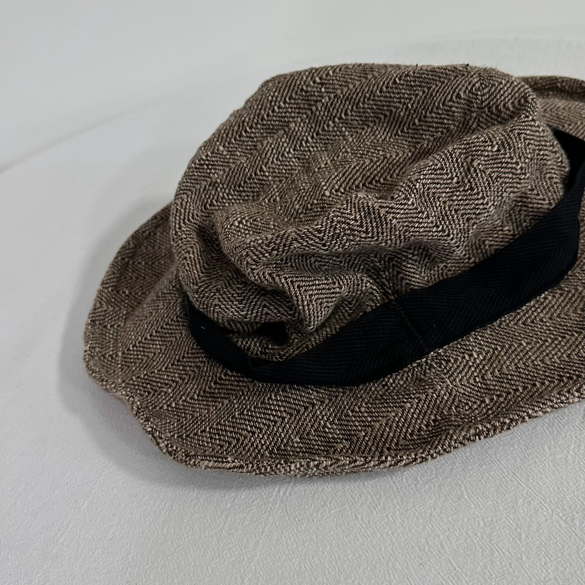Andrew Driftwood Walnut Dye Bucket Hat — label