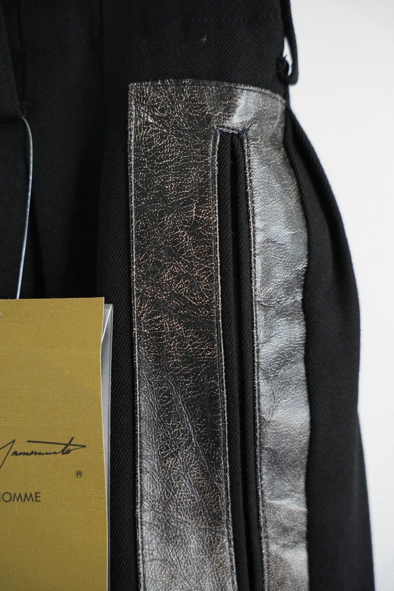 Yohji Yamamoto Cracked Leather Pocket Wool Pants — label