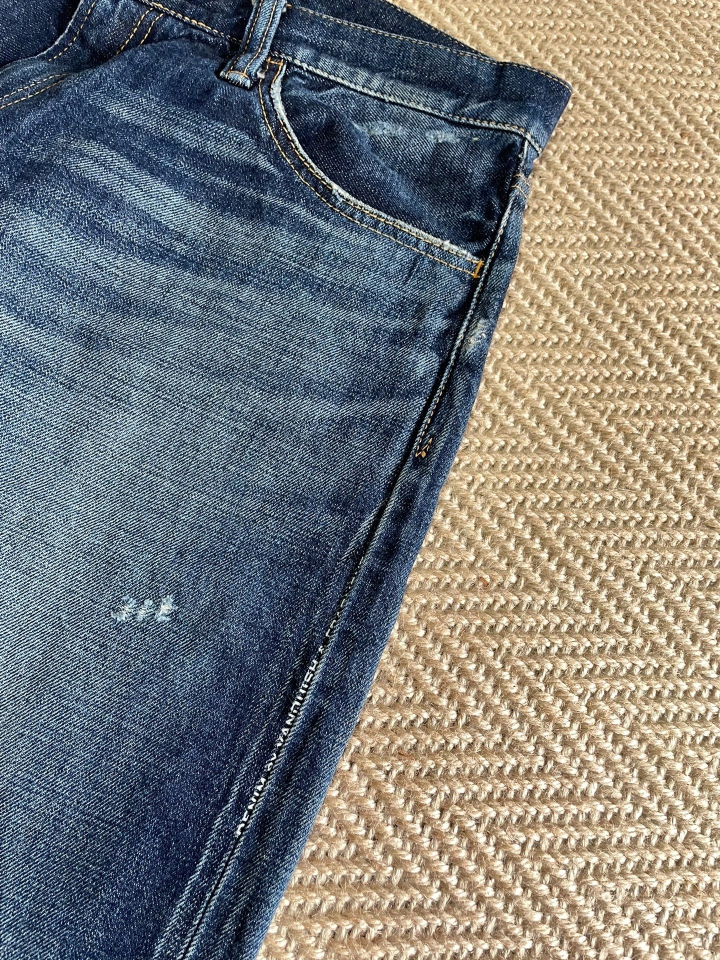 Vanquish Fragment Distressed Lightning Washed Jeans — label