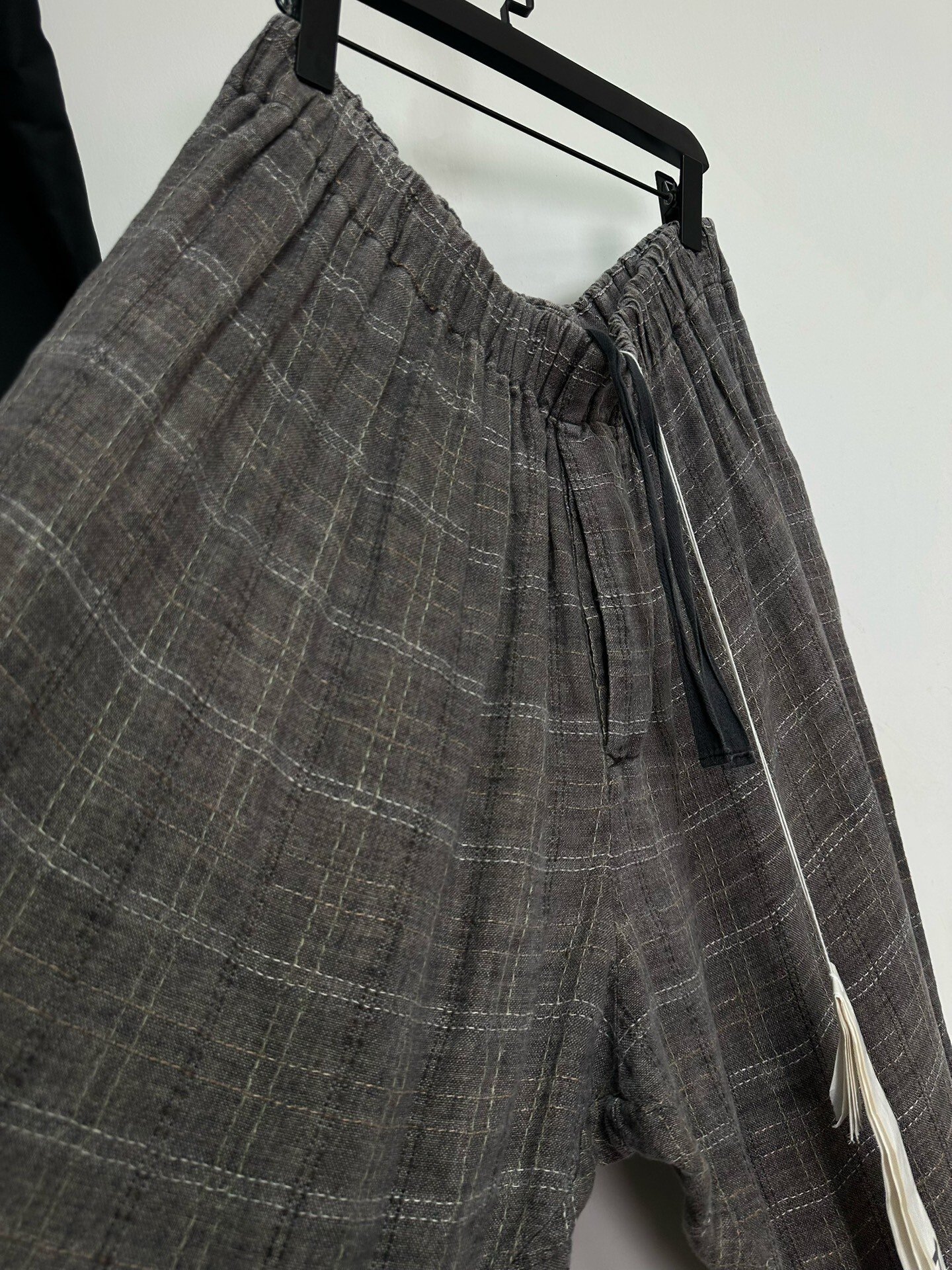 Casey Casey Hand-Stitched Linen Pants — label