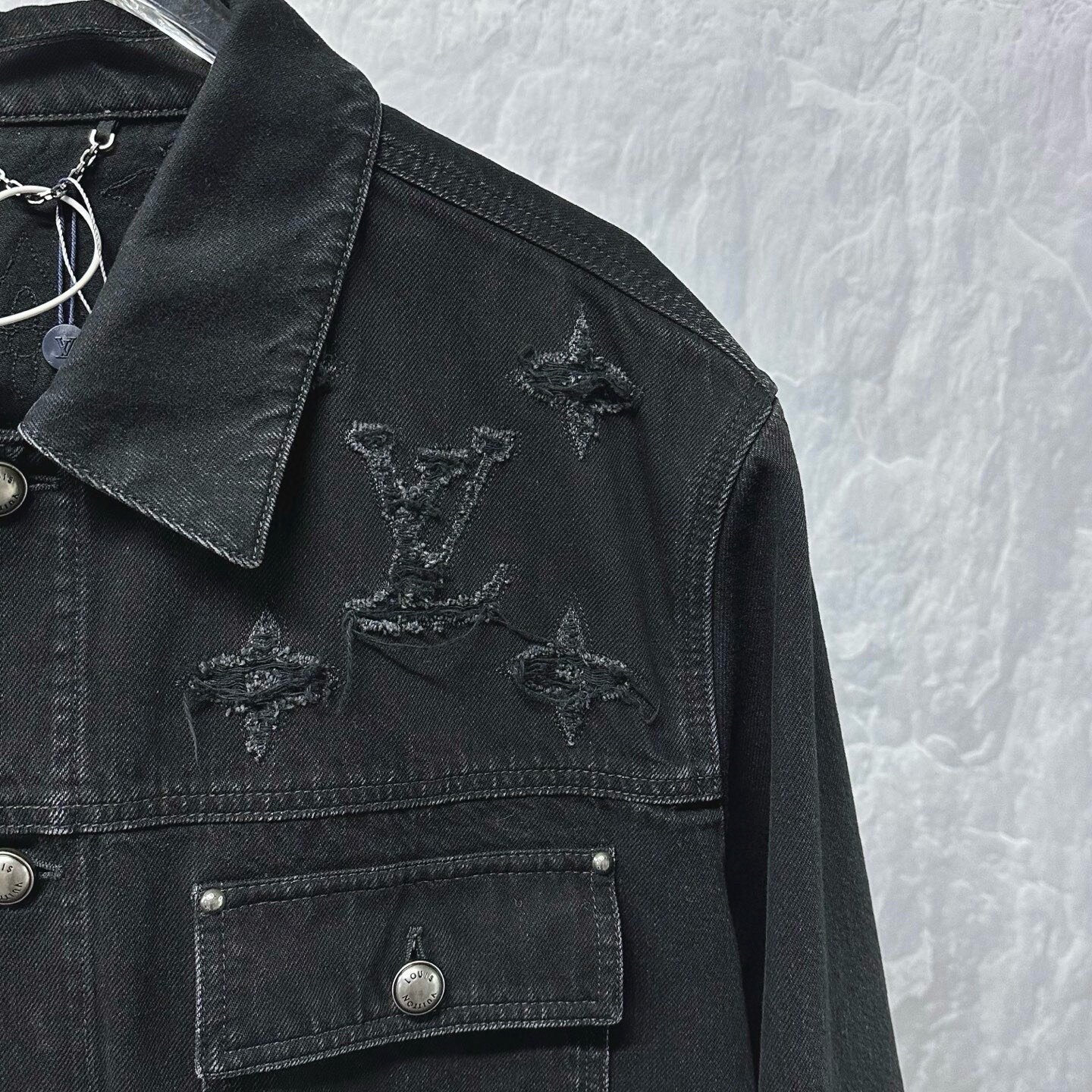 Louis Vuitton SS26 Distressed Logo Denim Jacket — detail