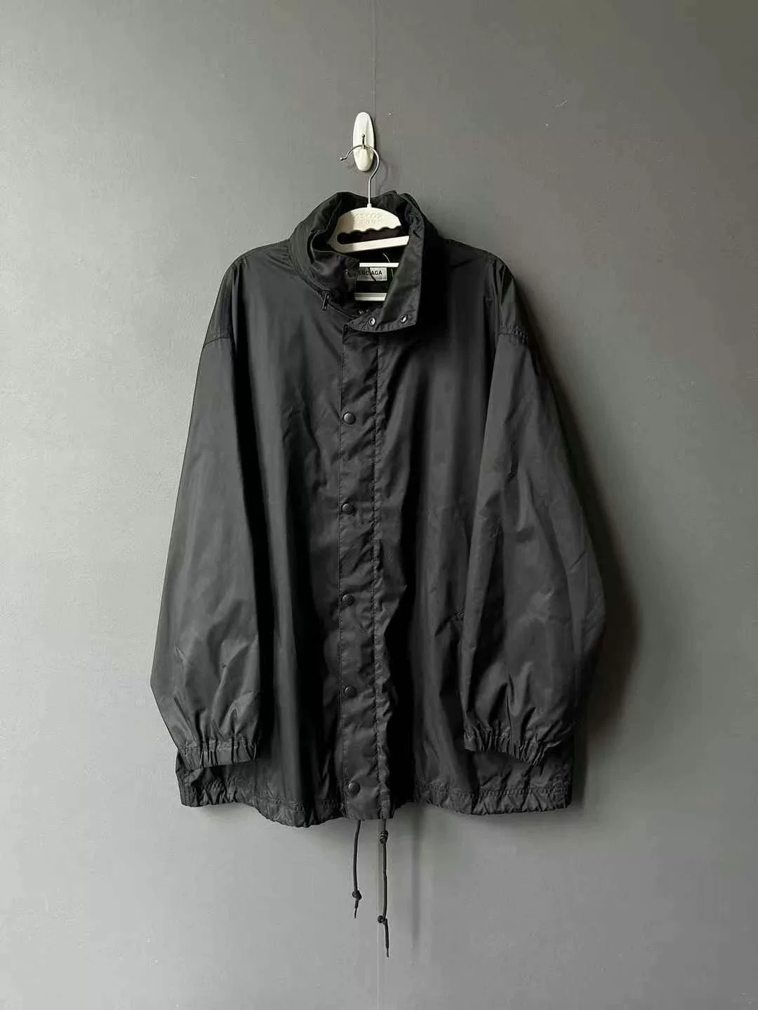 Balenciaga Seven-Language Black Windbreaker — front