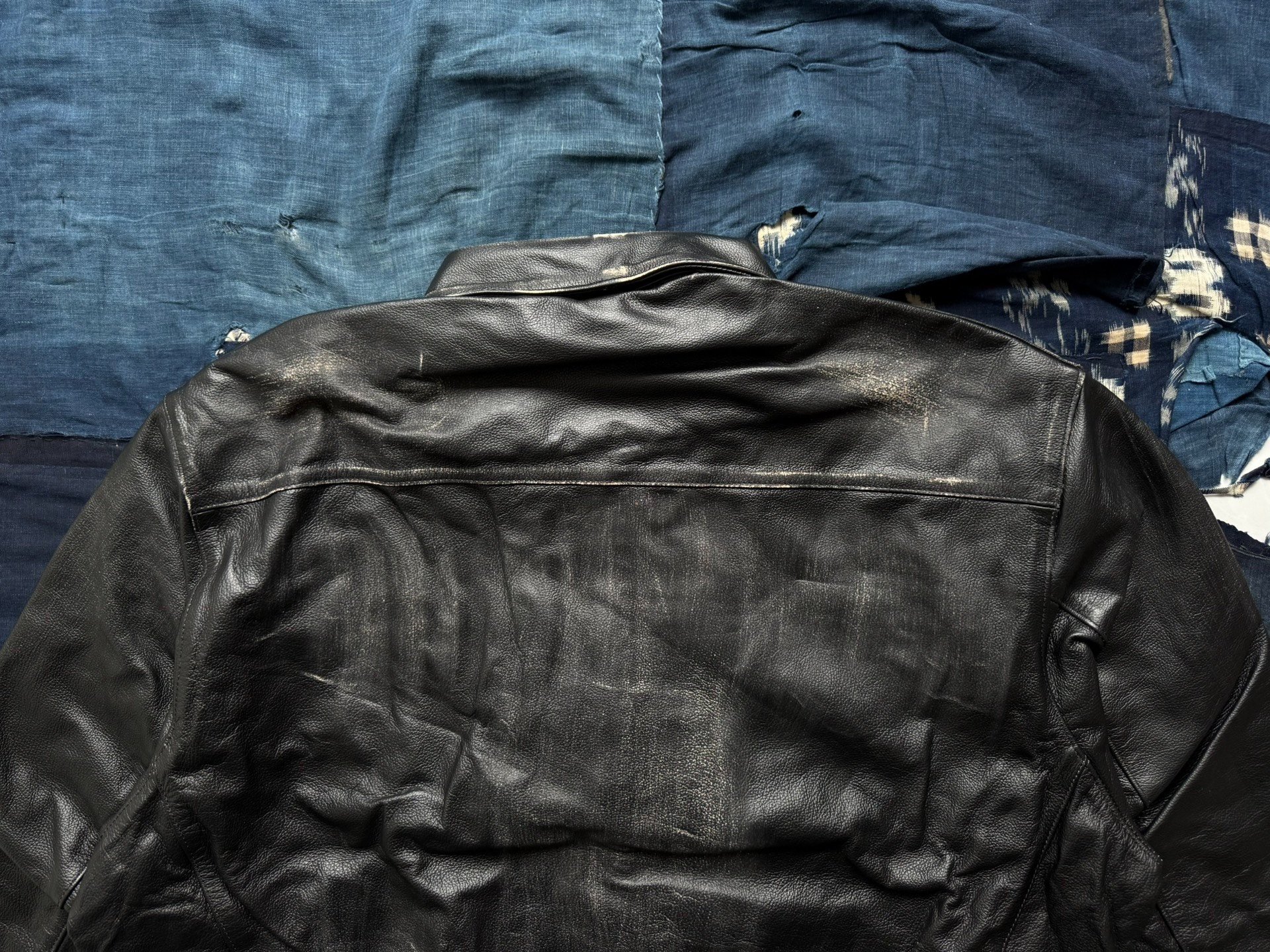 MADNESS LEATHER A2 AVIATOR JACKET — label