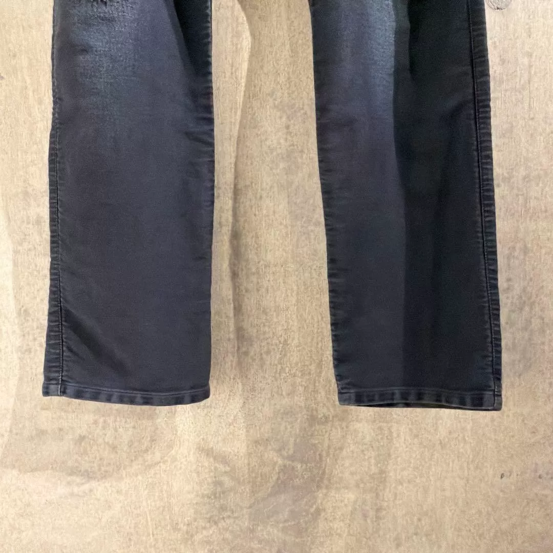 visvim DMGD Distressed Denim Pants — label