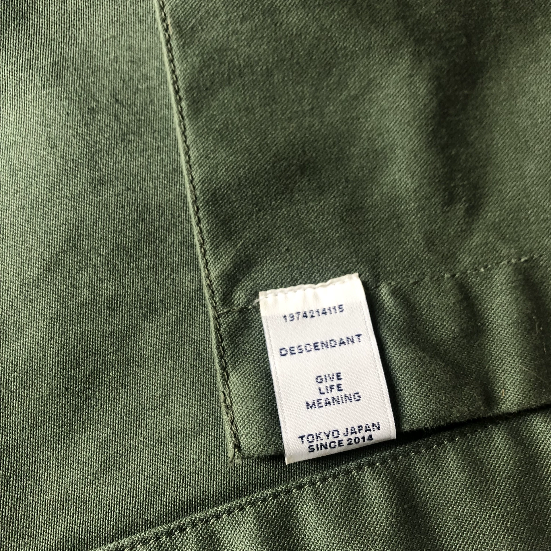 Descendant Two-Pocket Jacket — label