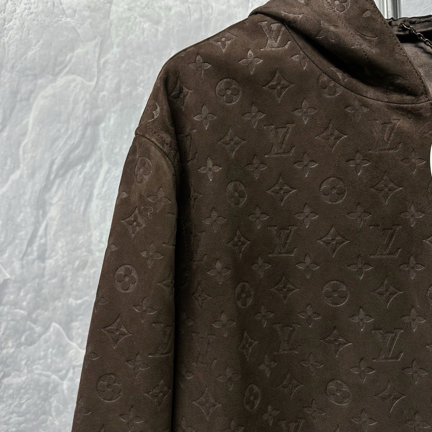 Louis Vuitton Monogram Embossed Hooded Sheepskin Jacket — detail