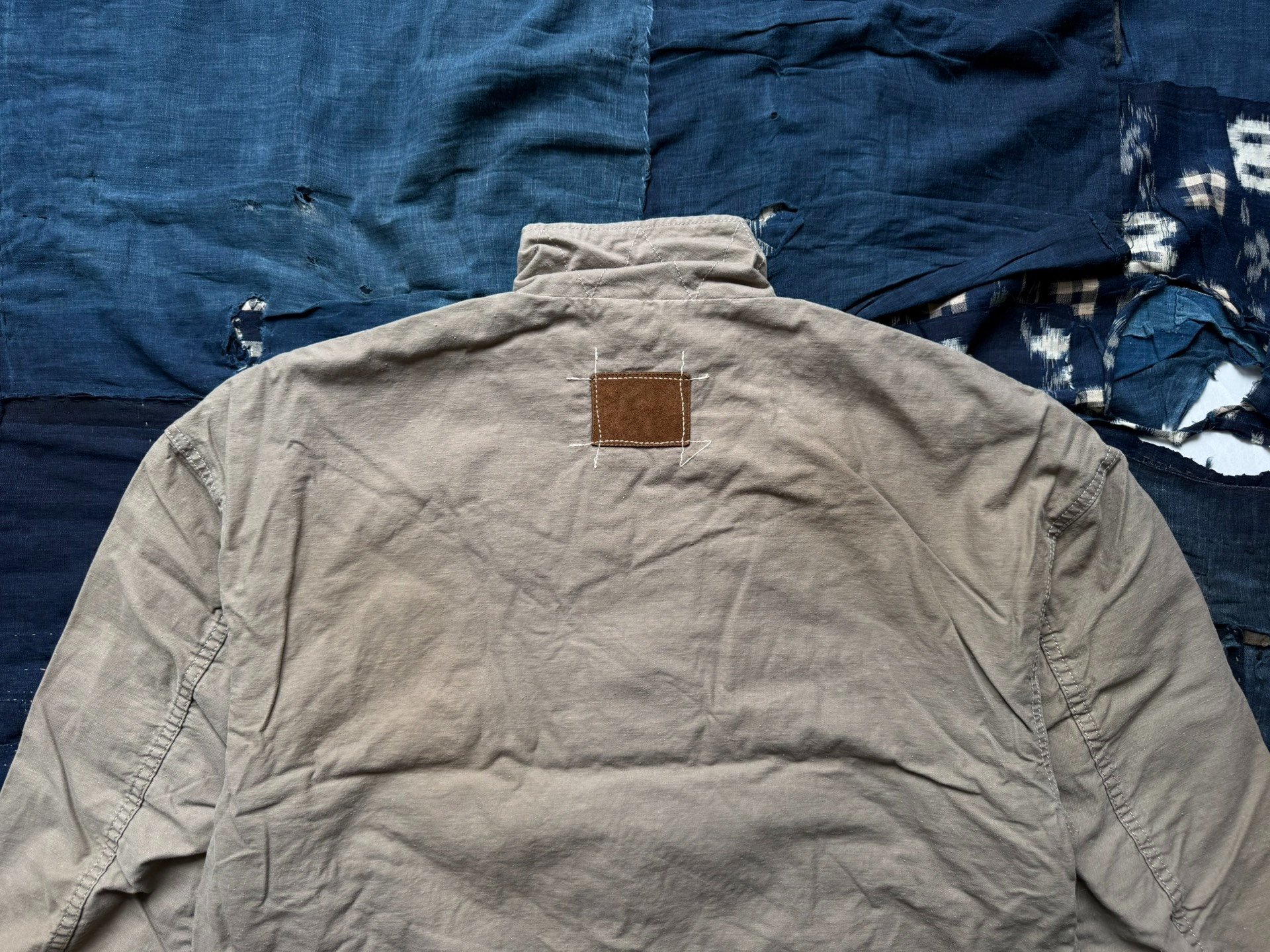 MADNESS 24AW REGENERATED N-4 DECK JACKET — label
