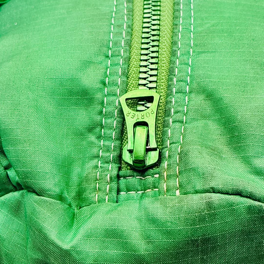 PORTER Boston Green Nylon Cylindrical Bag — label