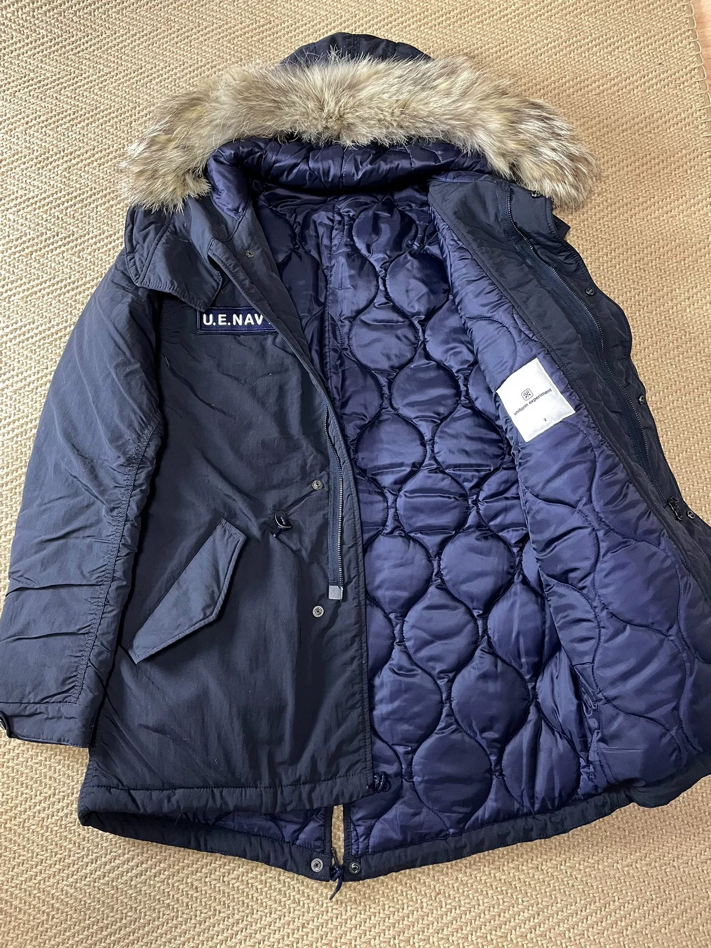 Uniform Experiment Padded Mods Coat — front