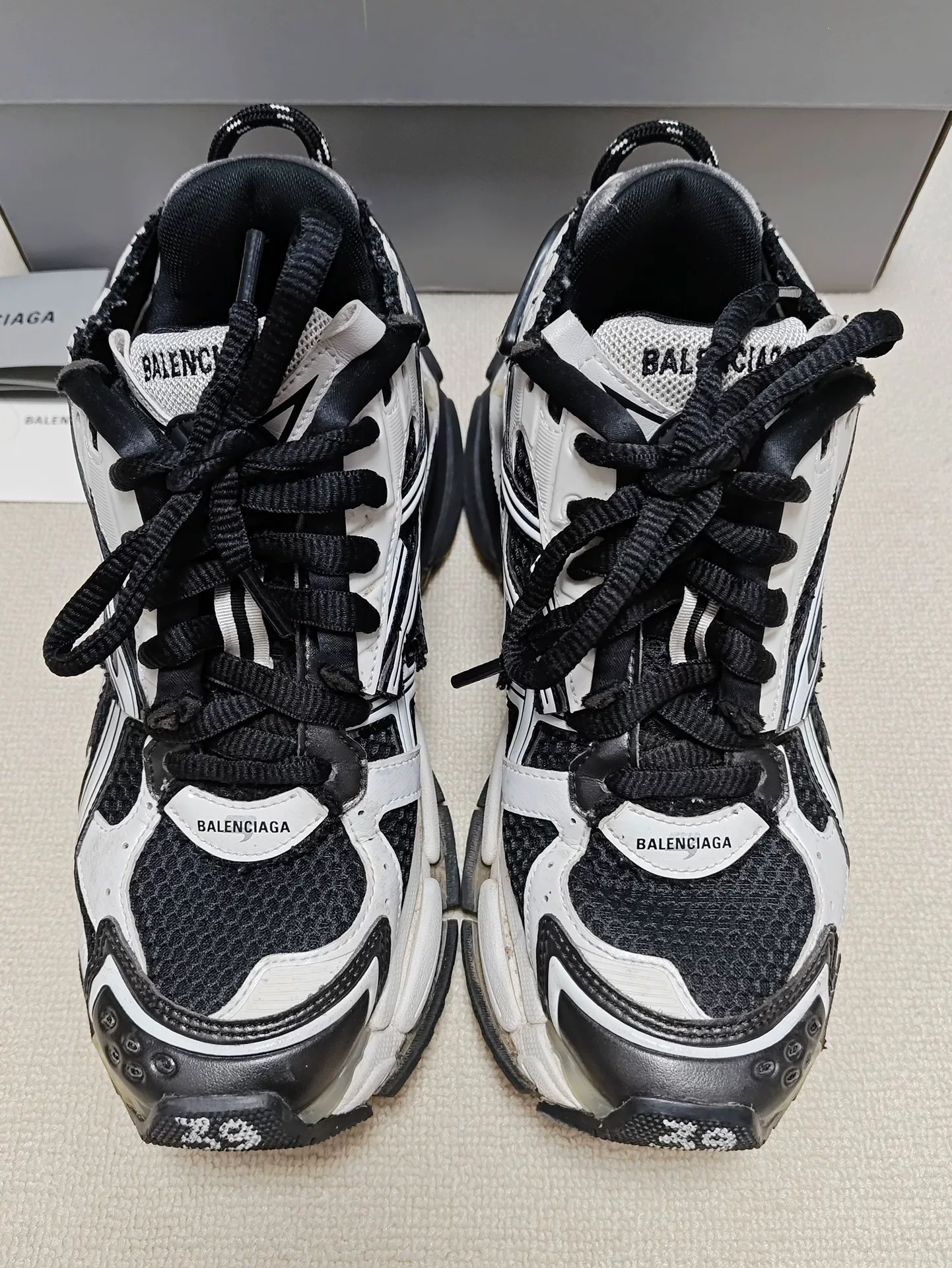 Balenciaga Runner Low-Top Distressed Sneakers — label