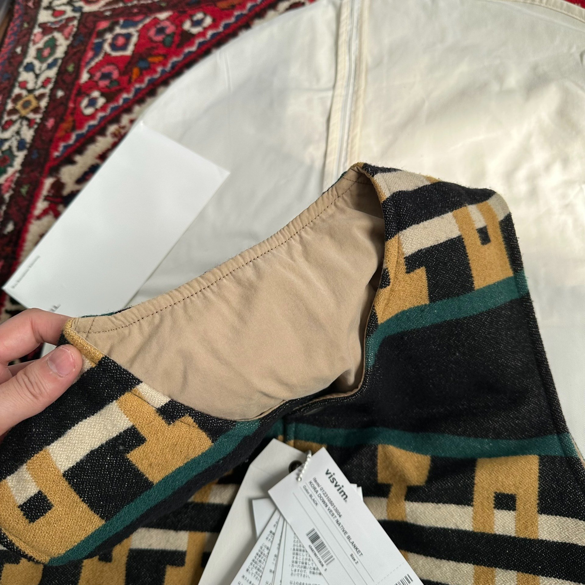 visvim 23ss KORA DOWN VEST — label