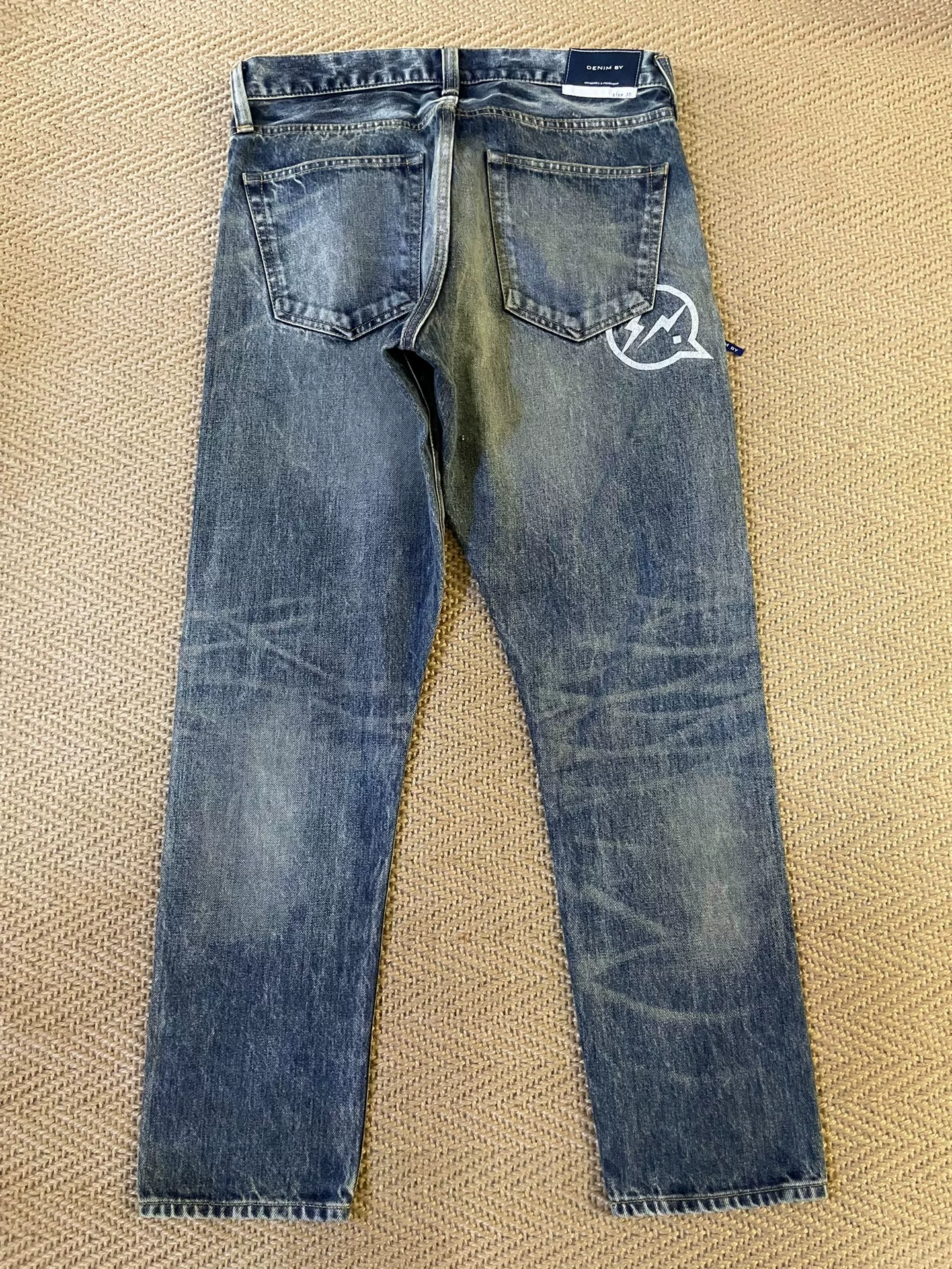 Vanquish & Fragment Distressed Denim Jeans — front