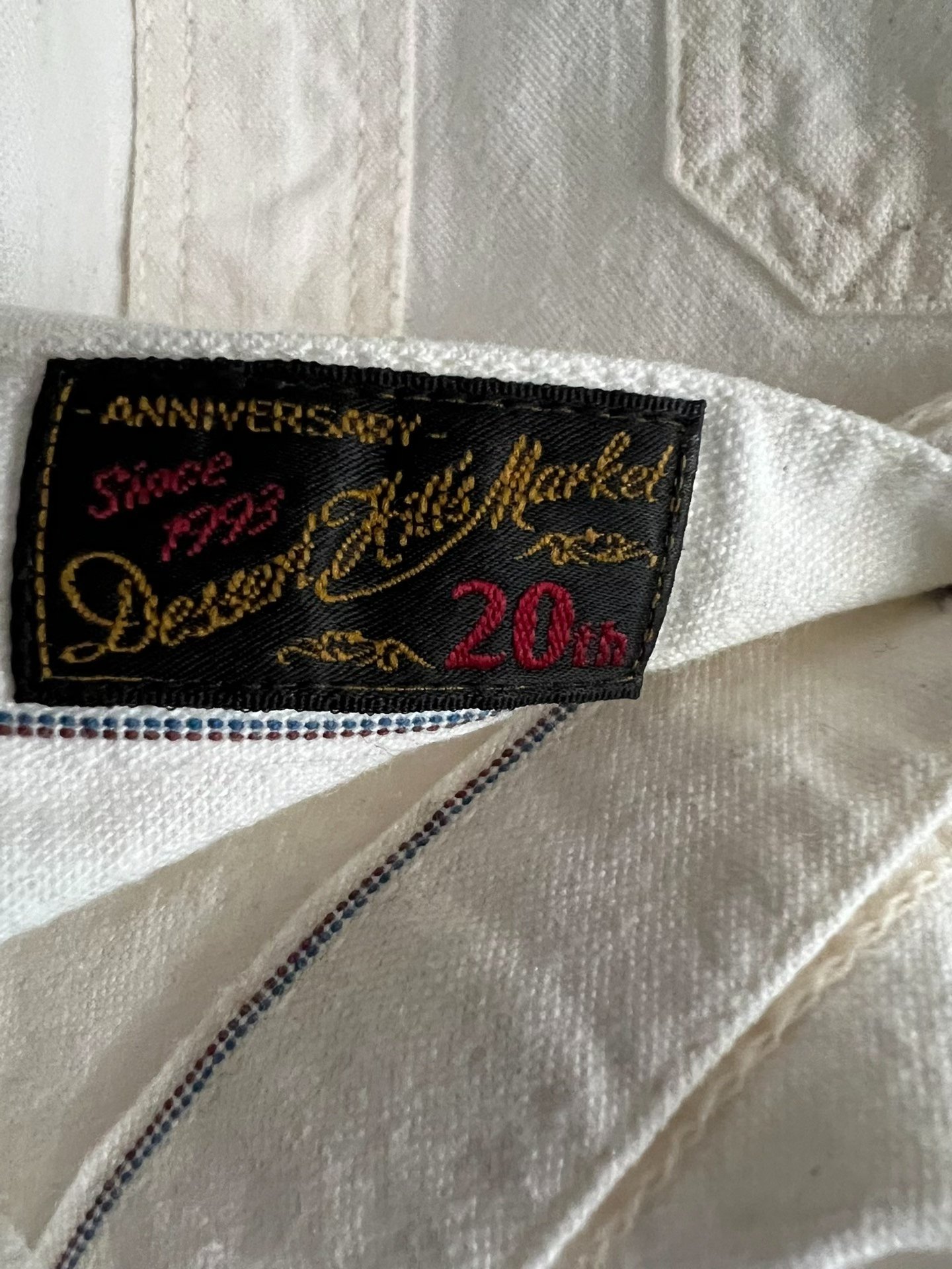 Flat Herd 20th Anniv White Work Shirt — label