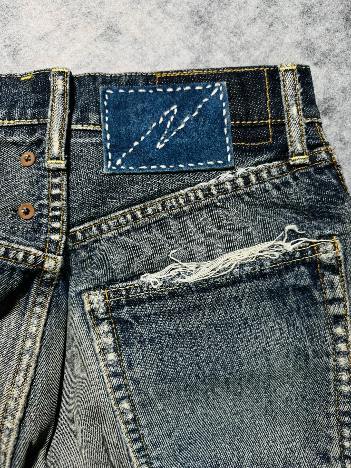 visvim Journeyman Patchwork Jeans — label