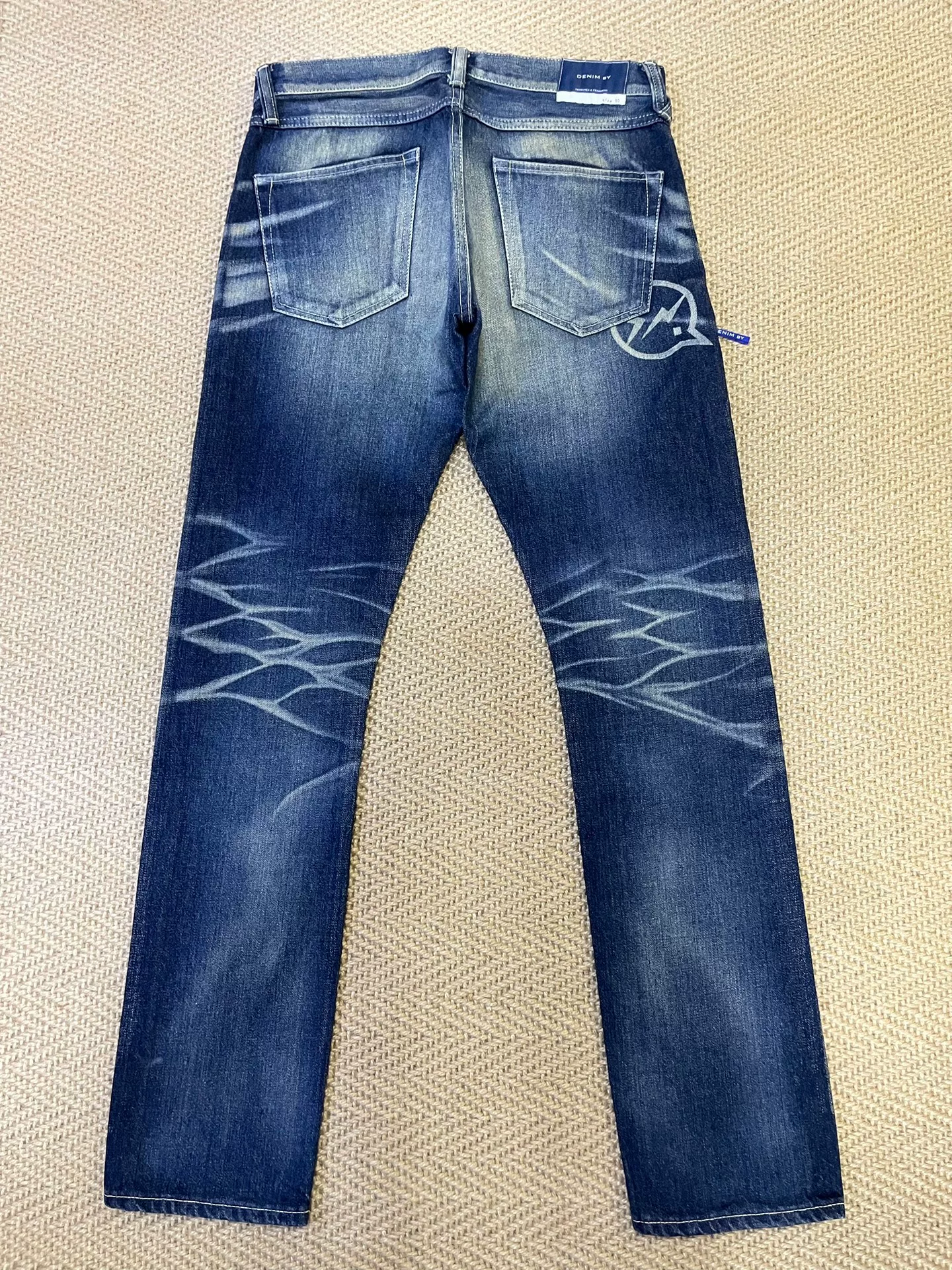Vanquish & Fragment Lightning Jeans — front