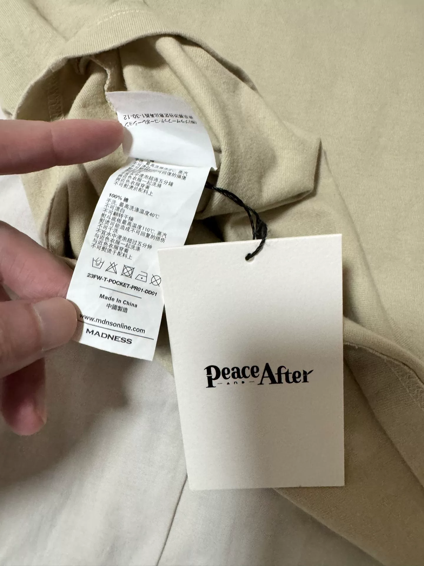 Madness x Peace 24ss 10th Anniv Pocket Tee — label