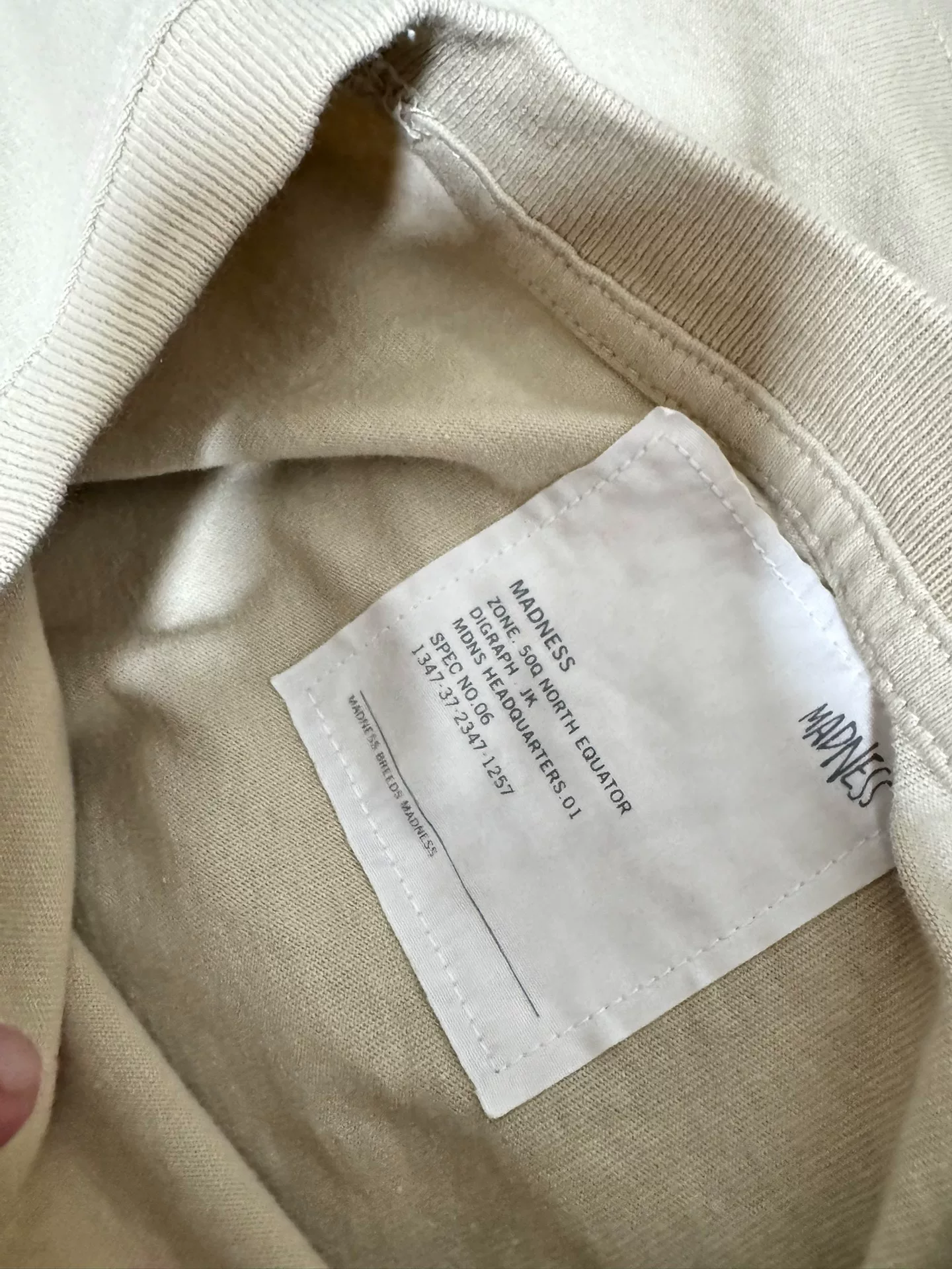 Madness x Peace 24ss 10th Anniv Pocket Tee — detail