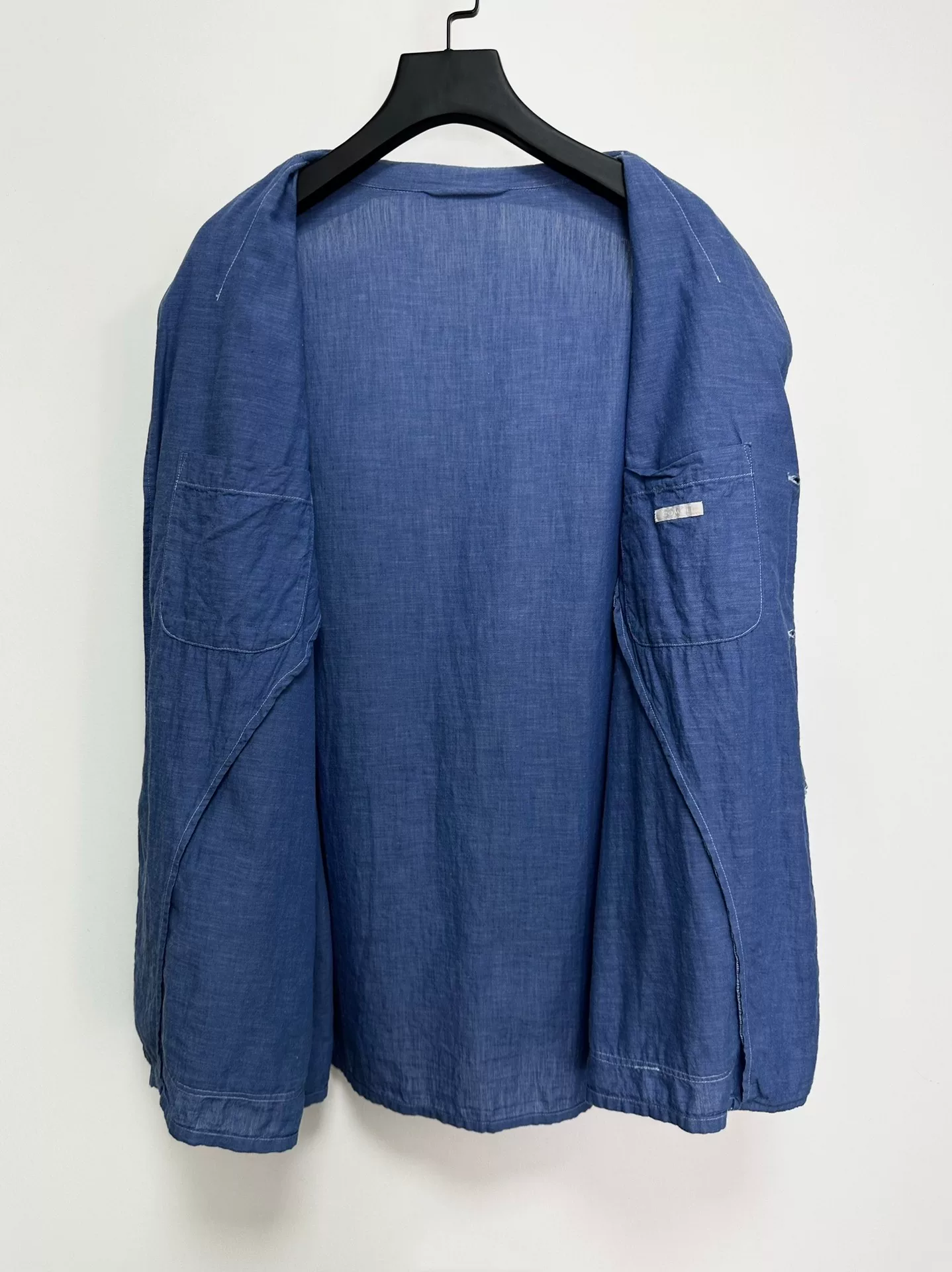 COMOLI Indigo Washed Cotton Coat — detail