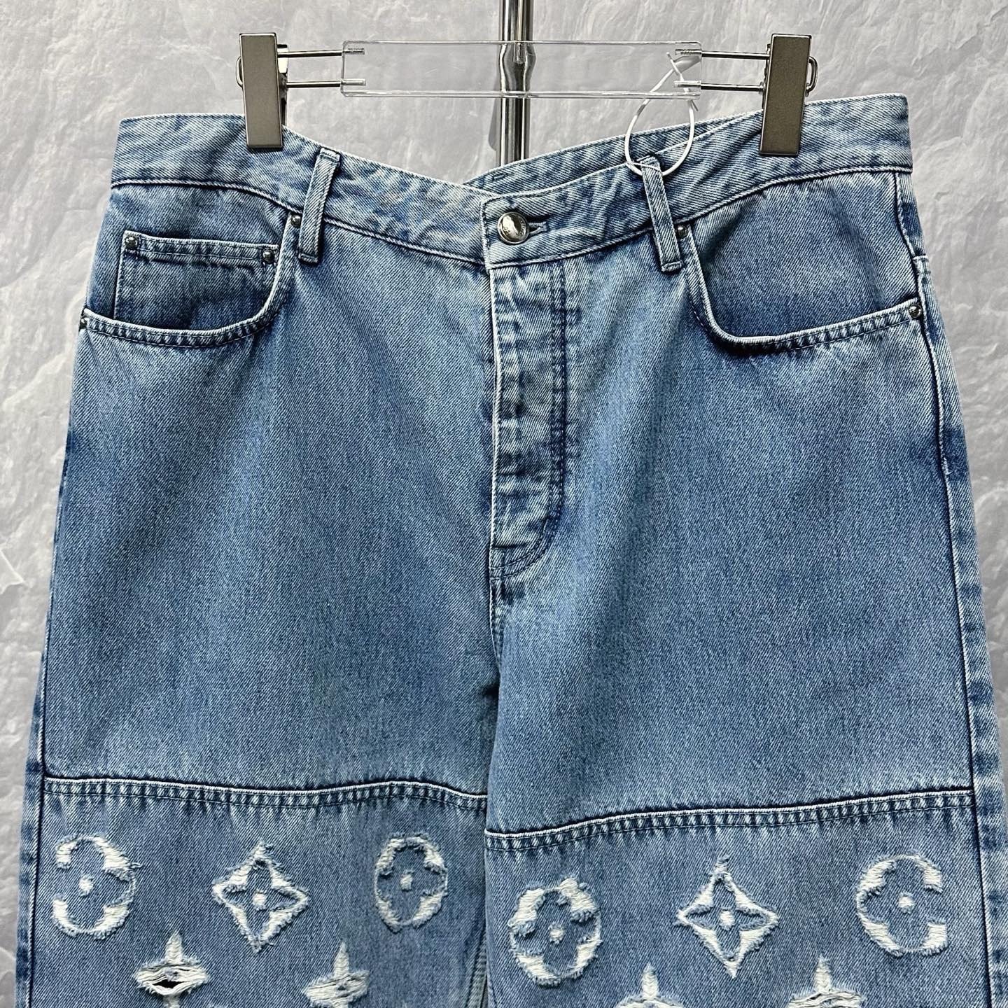 Louis Vuitton SS25 Distressed Logo Denim Pants — front