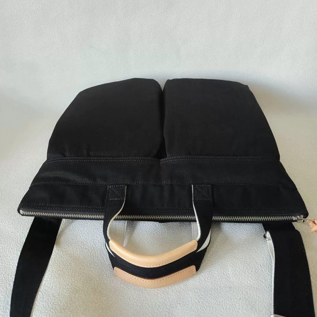 PORTER_NOIR 2WAY HELMET BAG — label