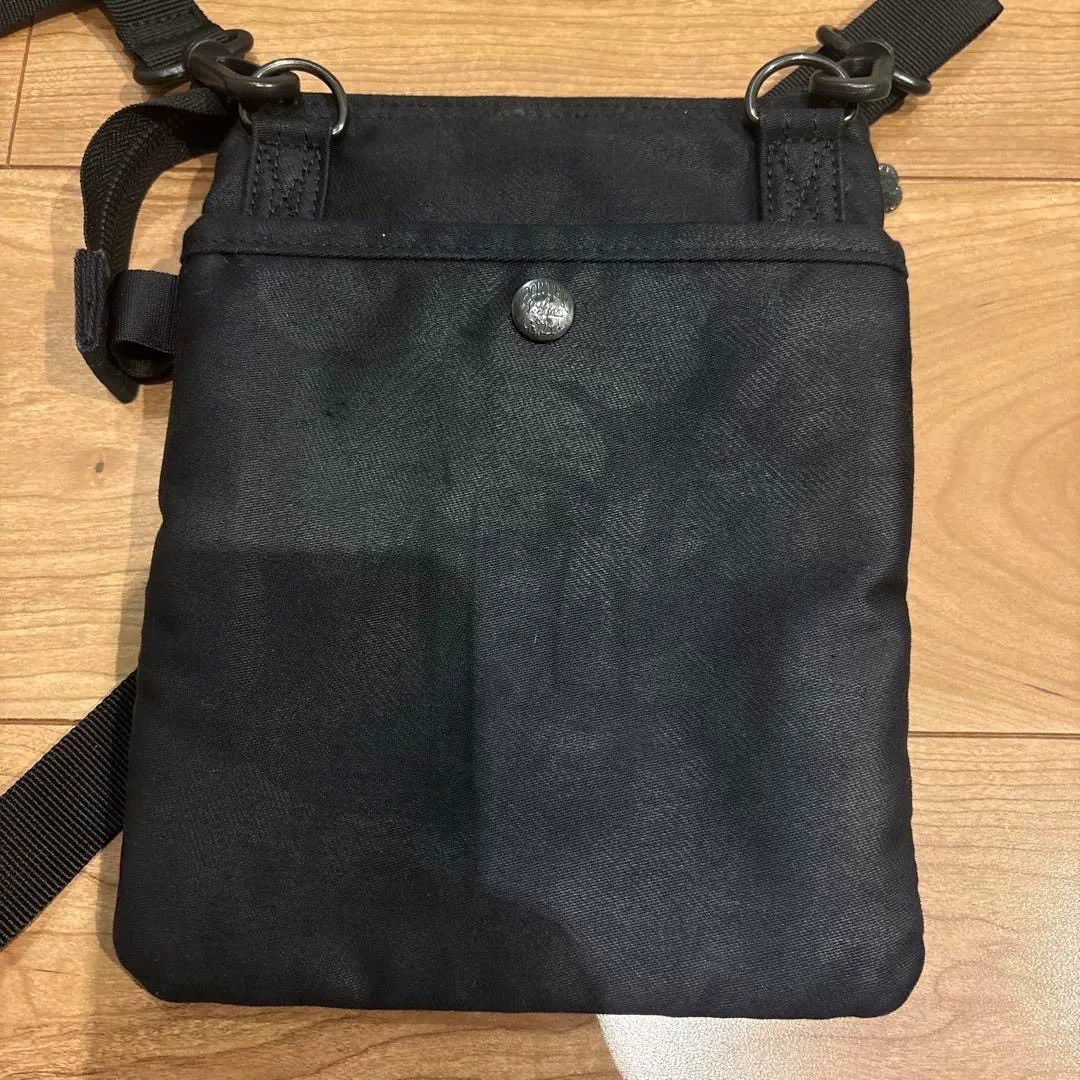 PORTER Black Single-Shoulder Canvas Bag — label