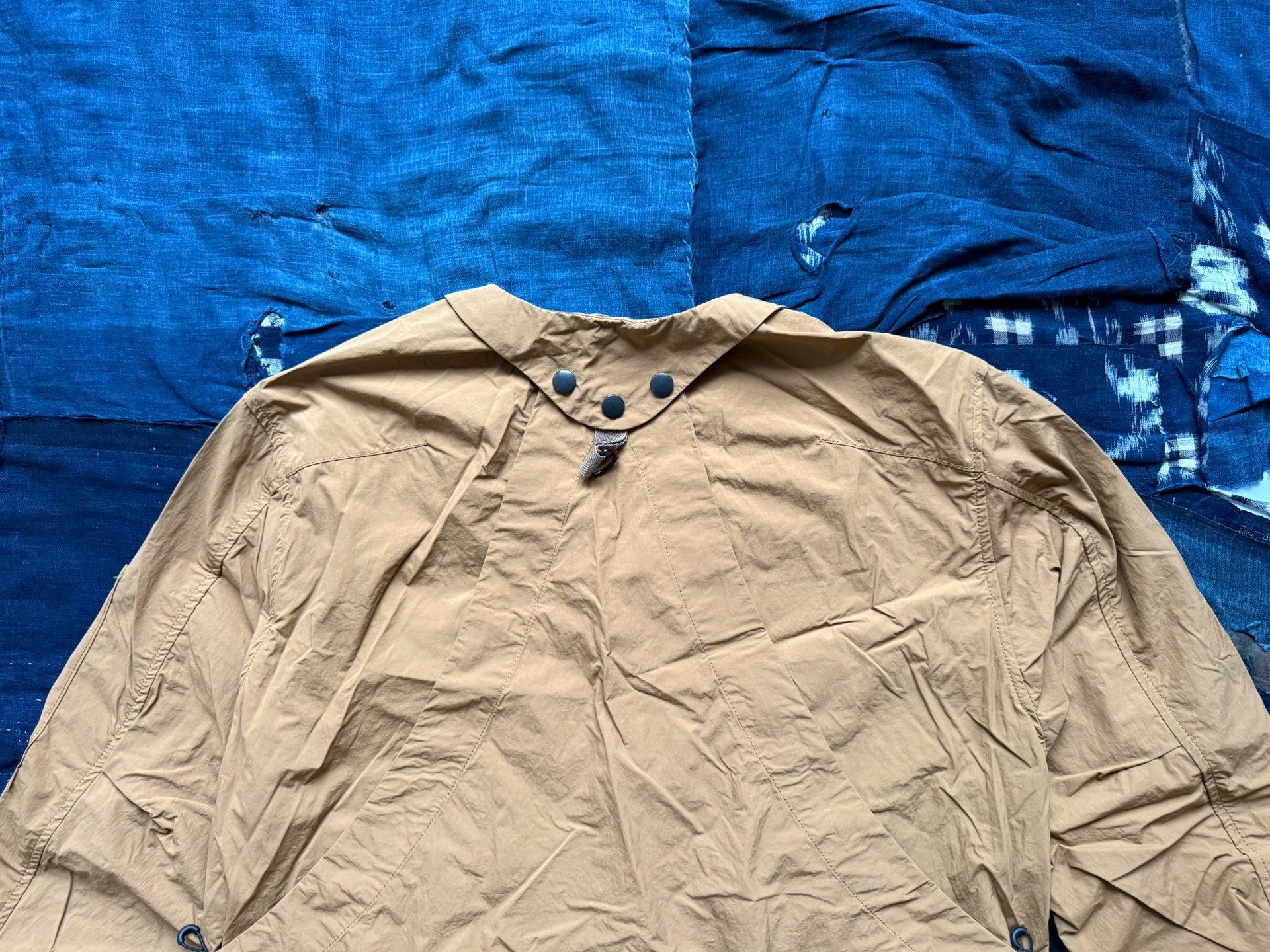 NORBIT BY HIROSHI Field Waterproof Jacket — label
