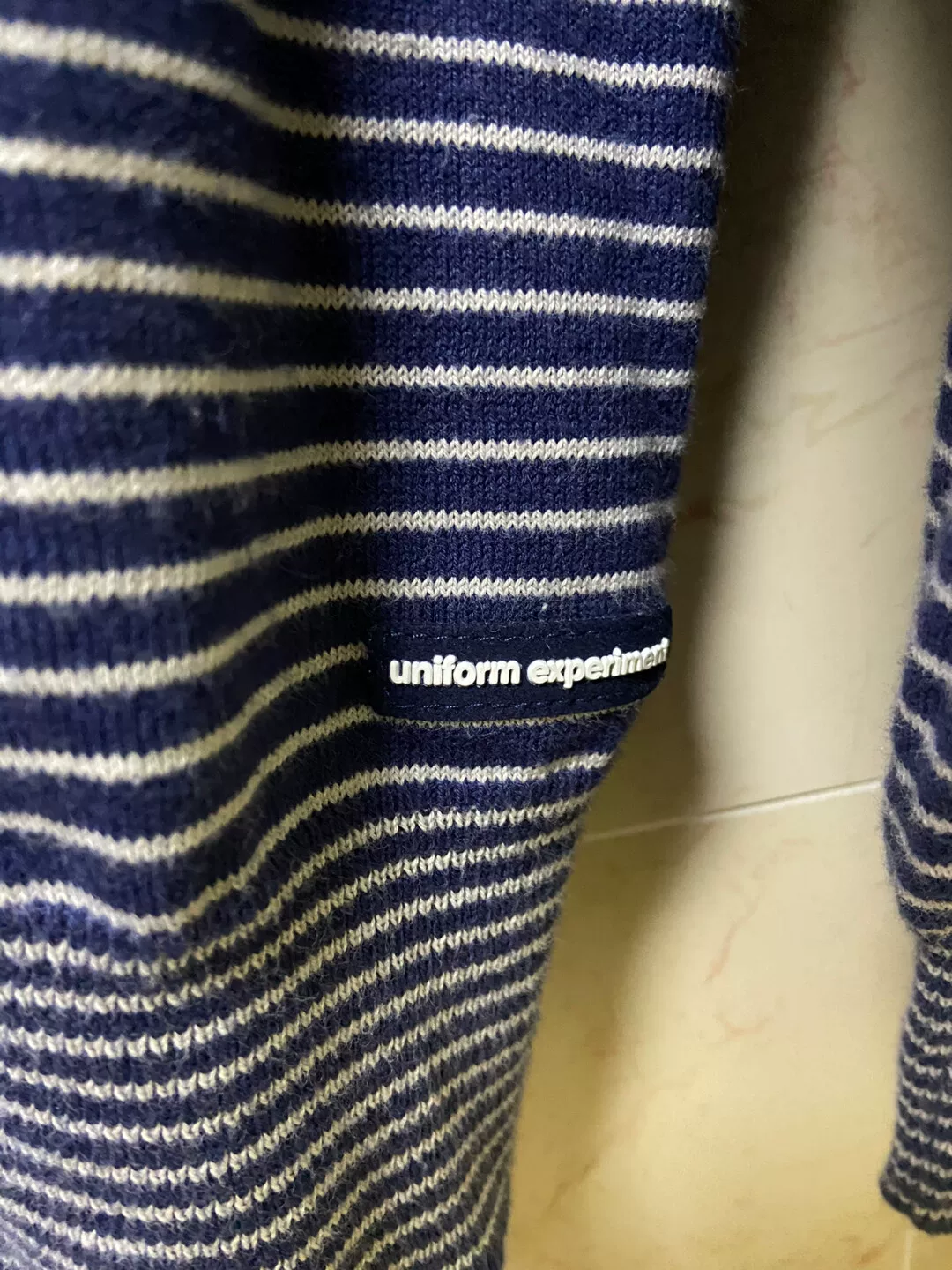 uniform experiment striped border crew sweater — detail