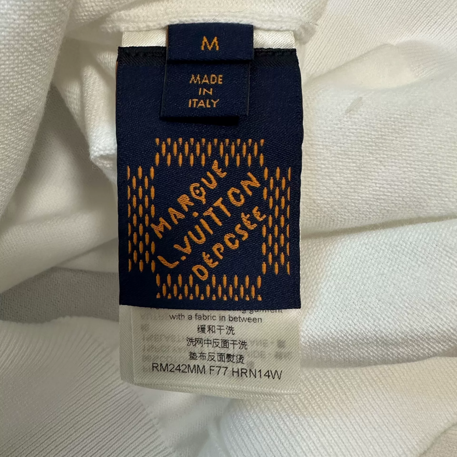 Louis Vuitton White Pearl Button Polo Shirt — label