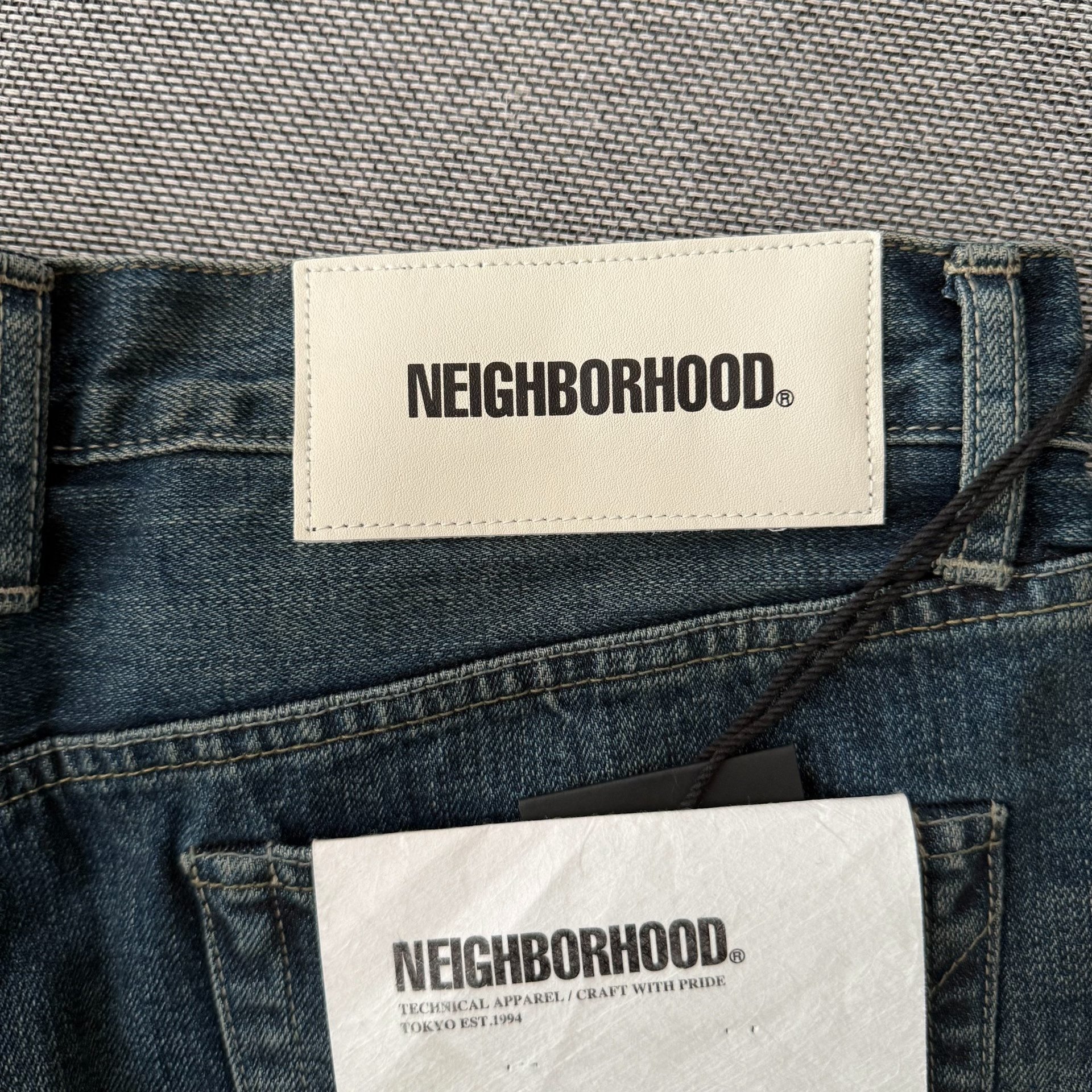 Neighborhood 25AW Basic Washed Jeans — back
