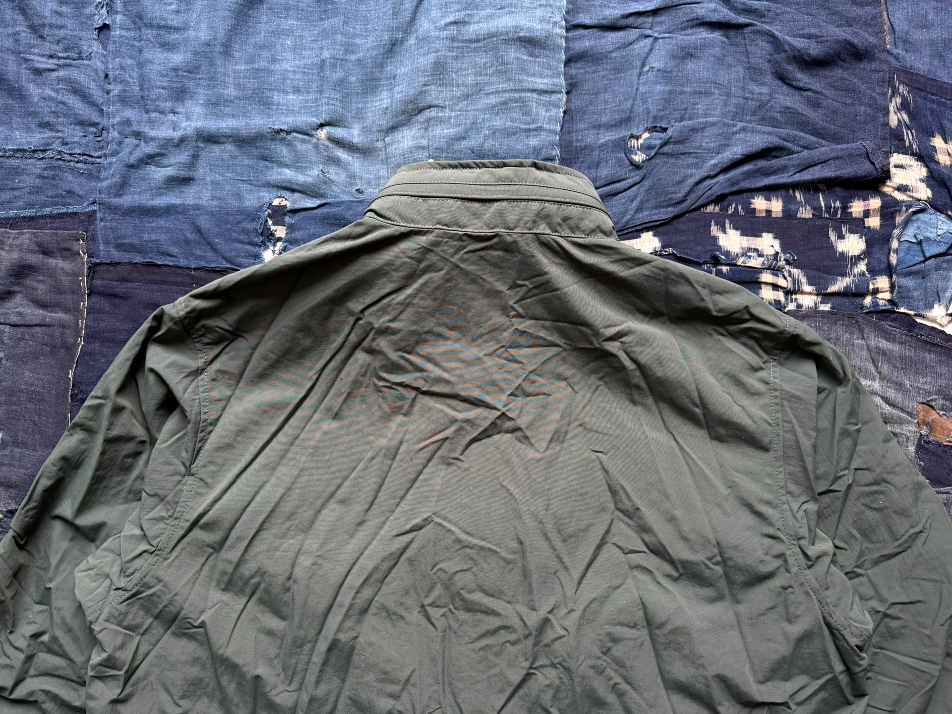 DAIWA PIER39 Tech Hiker Mountain Parka — label
