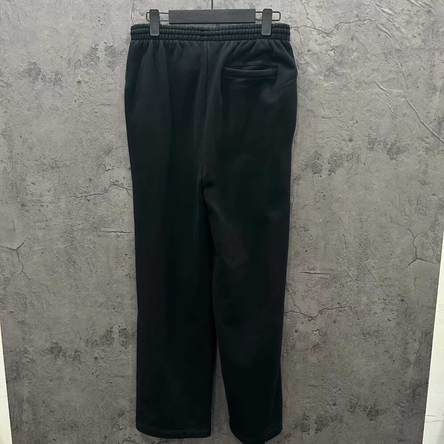Balenciaga Double Hook Logo Distressed Black Trousers — front
