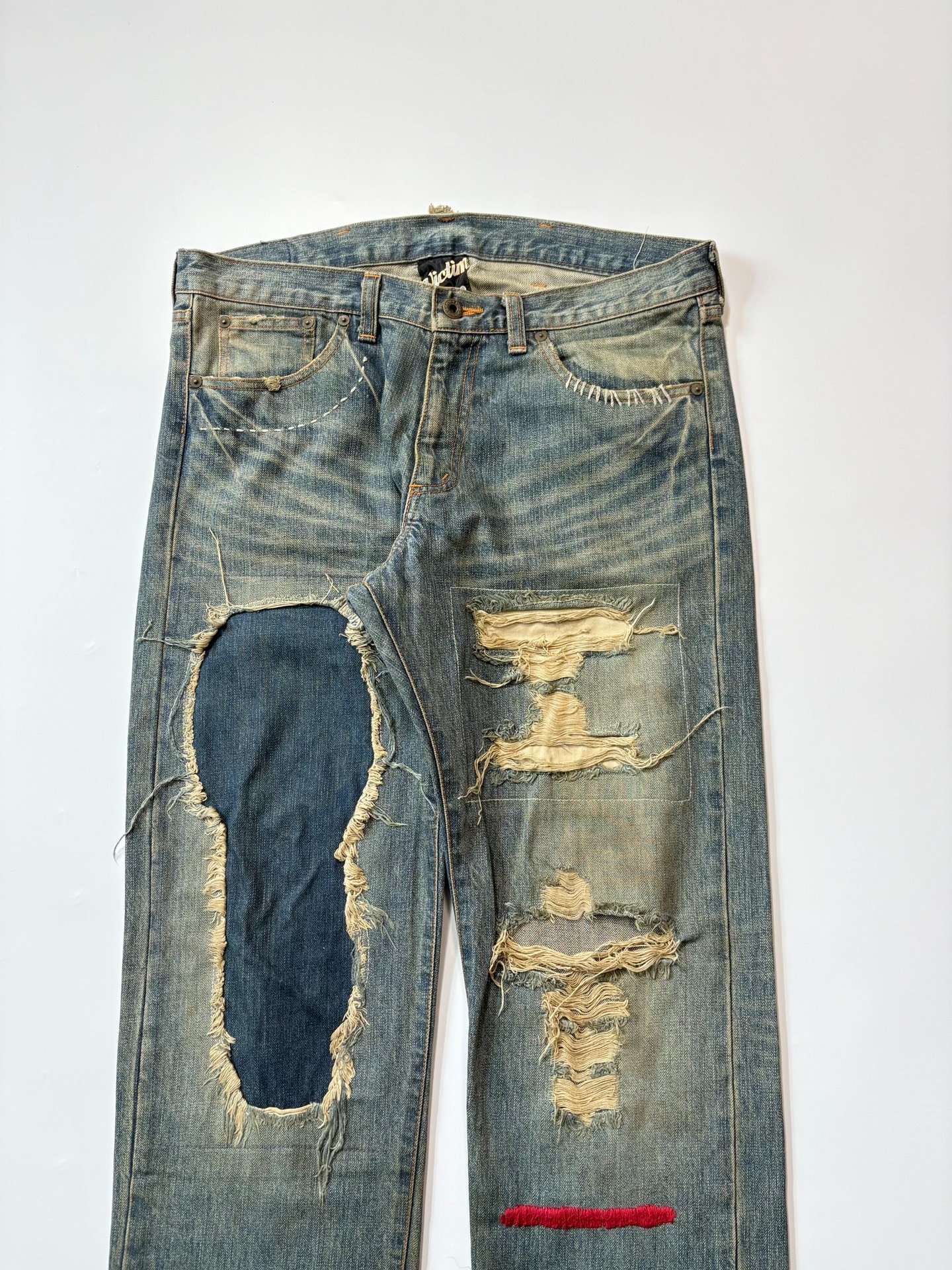 VICTIM Distressed Patch Washed Jeans — front
