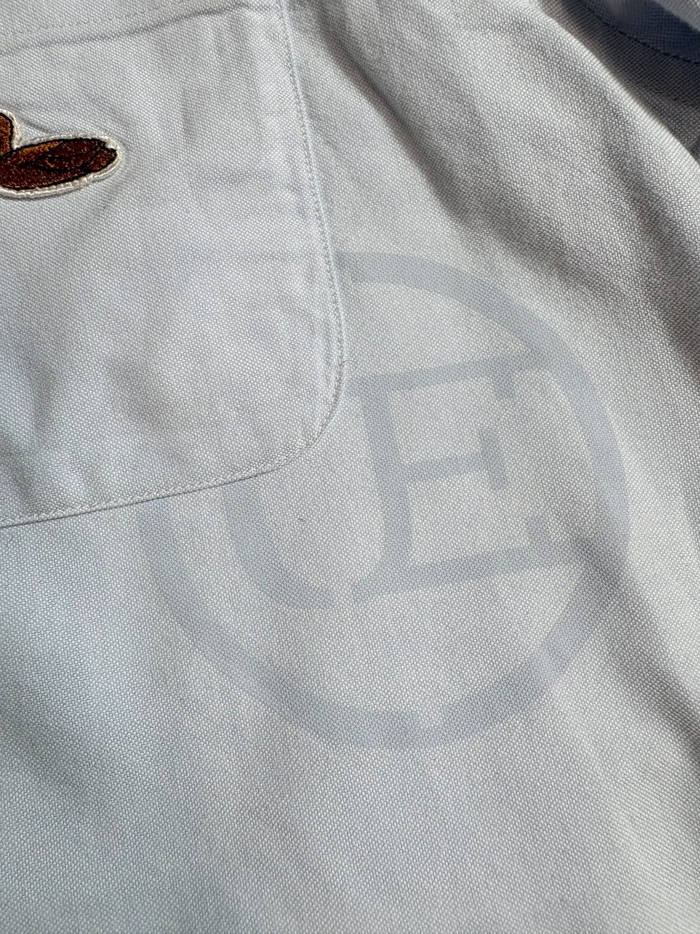 uniform experiment x Carhartt shirt — detail