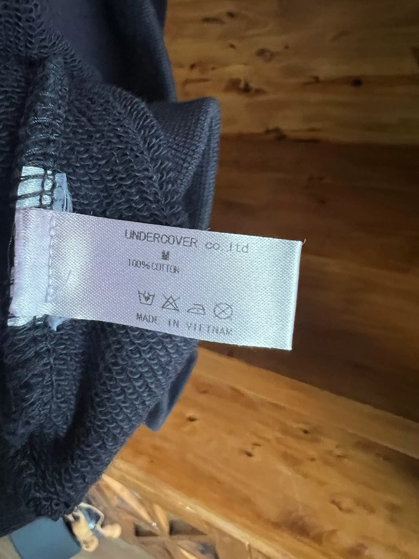 Undercover Indigo Dyed Floral Sweatshirt — label