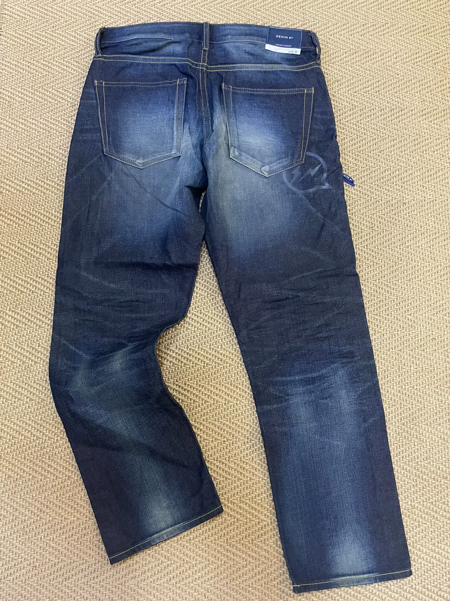 Vanquish Fragment Lightning Yellow Mud Jeans — front