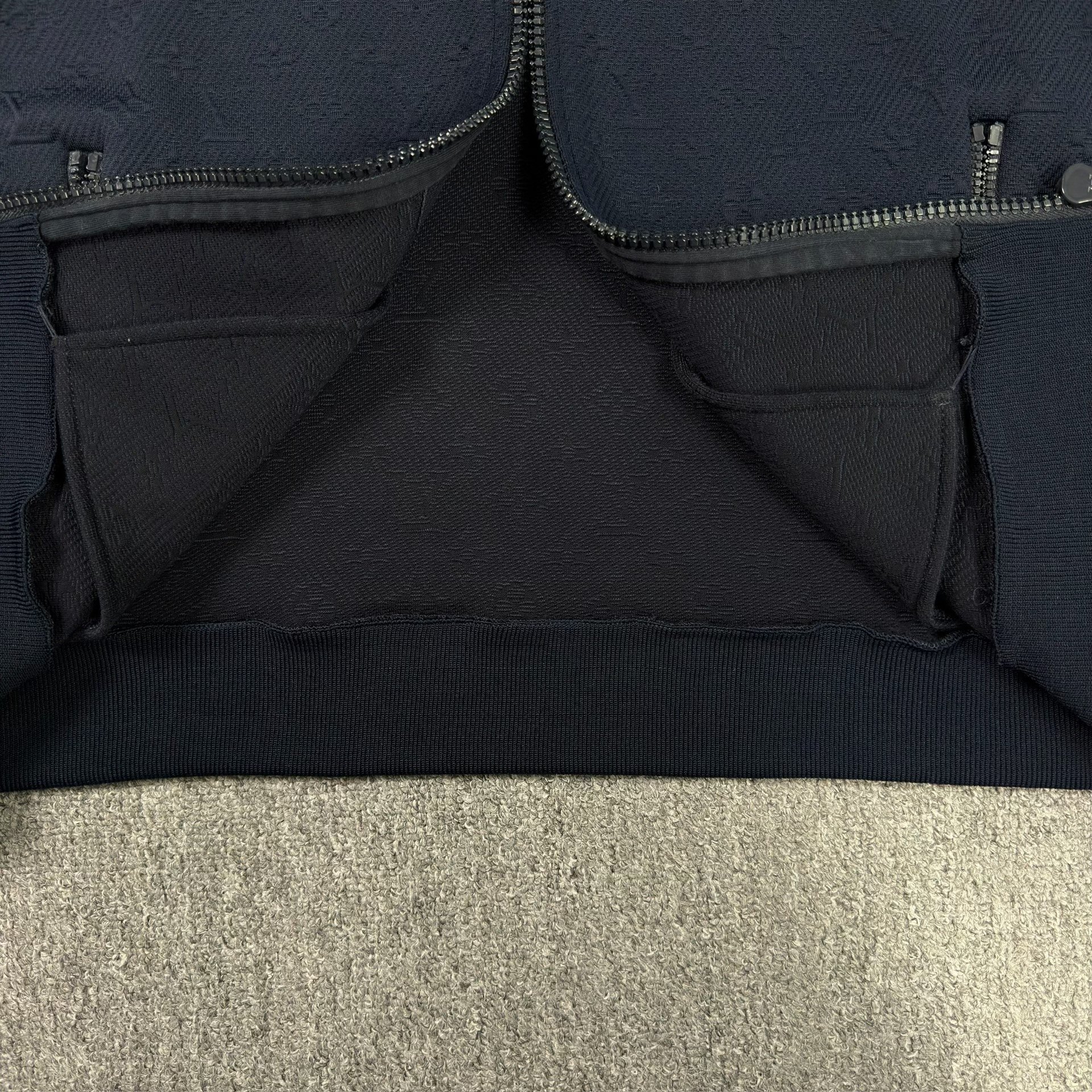 Louis Vuitton Navy Embossed Bomber Jacket — label