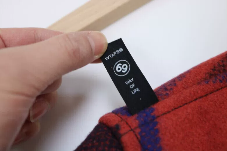 WTAPS Lamber Wool Melton Jacket — label