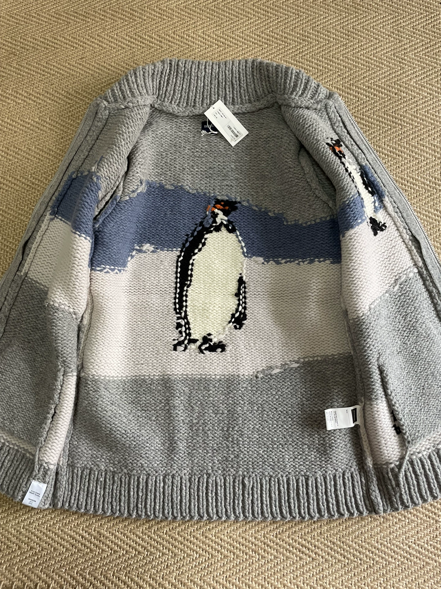 Descendant Manchot Cowichan Knit Coat — label