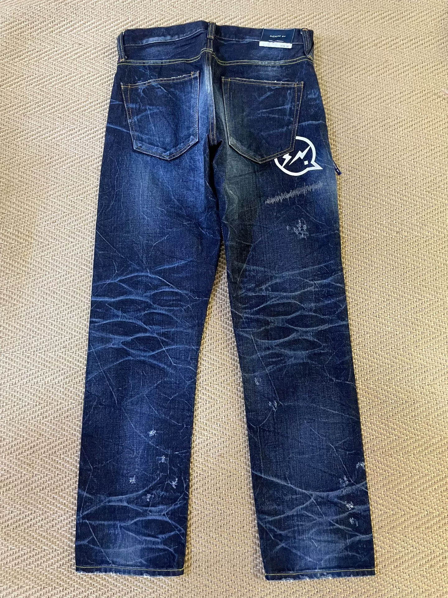 Vanquish Fragment Distressed Denim Jeans — front