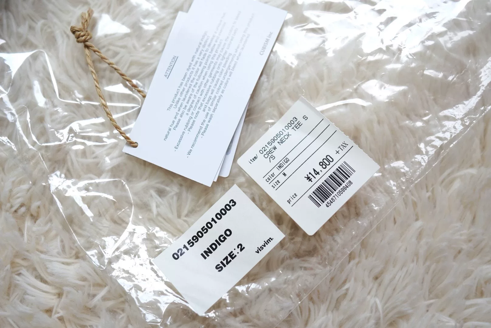 visvim indigo crew neck tee — label