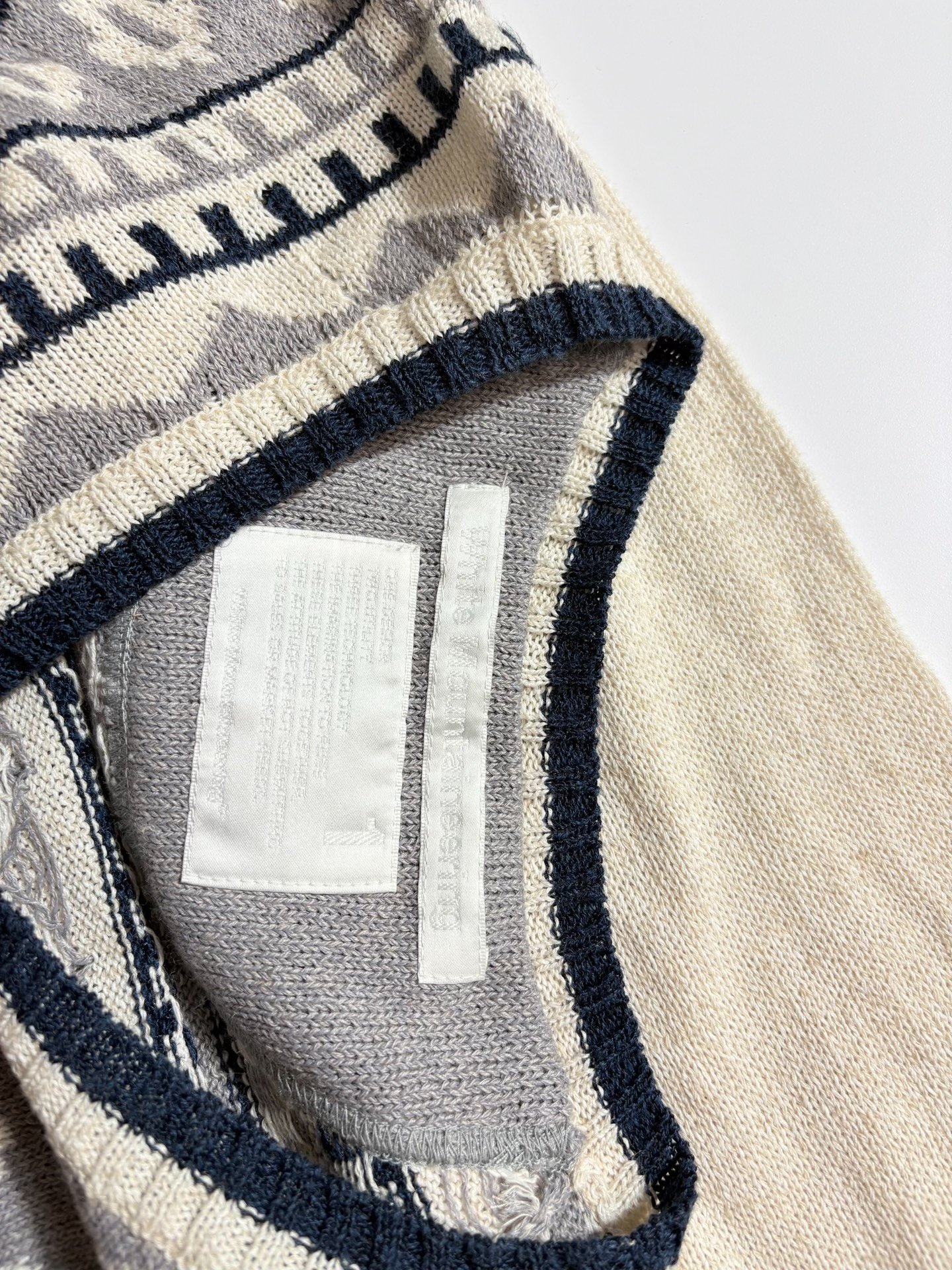 White Mountianeering Off-White Sweater — label