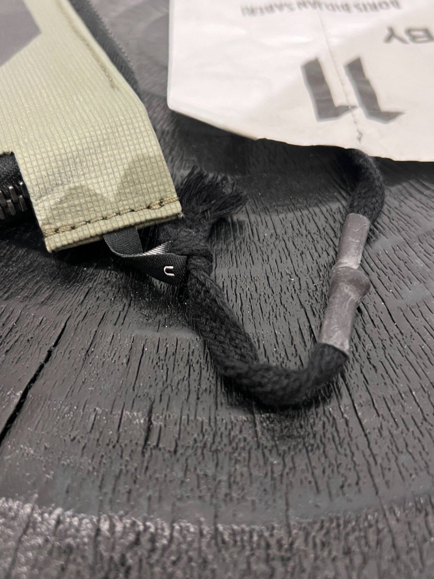 Boris Bidjan Saberi 11 Nylon Wallet — label