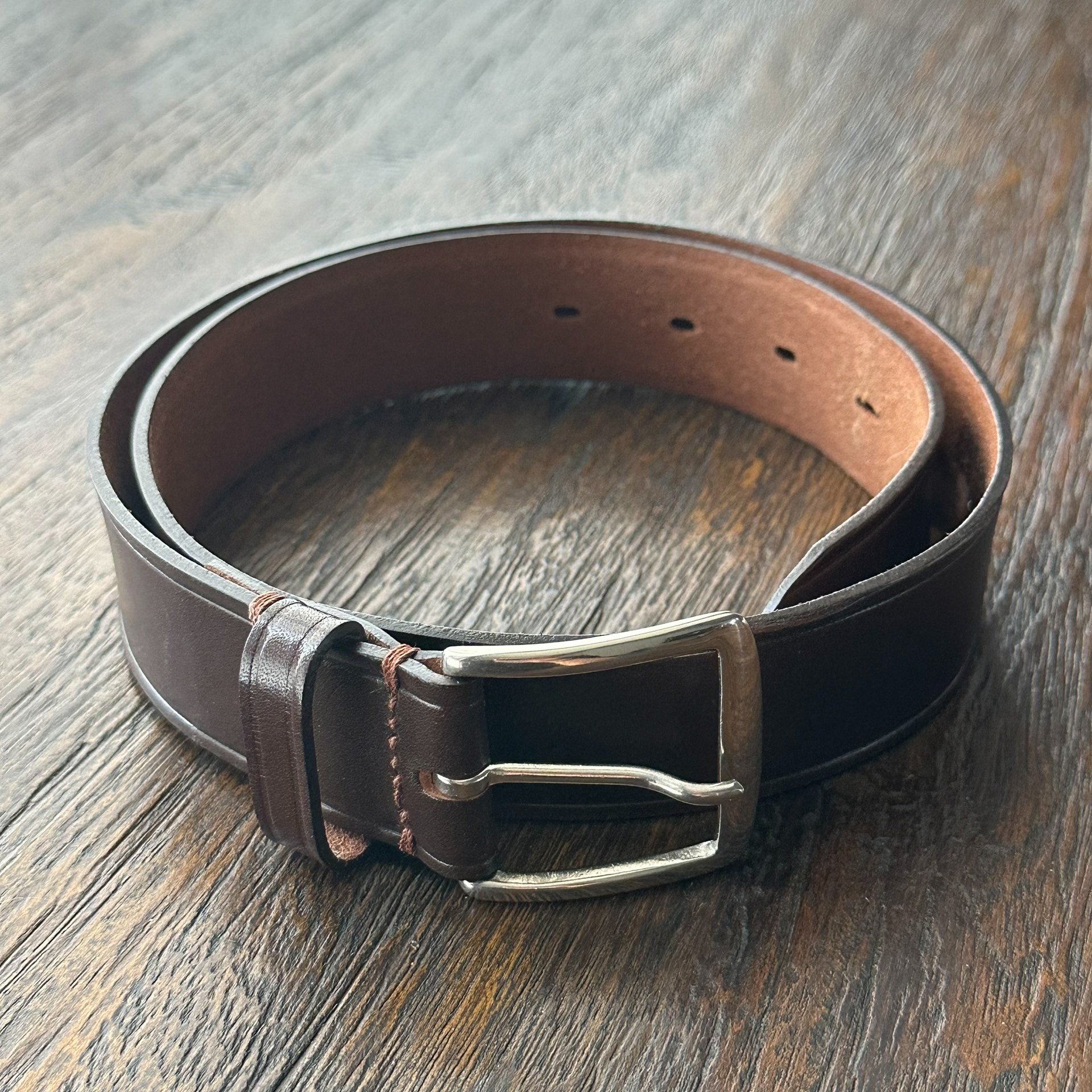 TWC Solid Brass Brown Belt — label